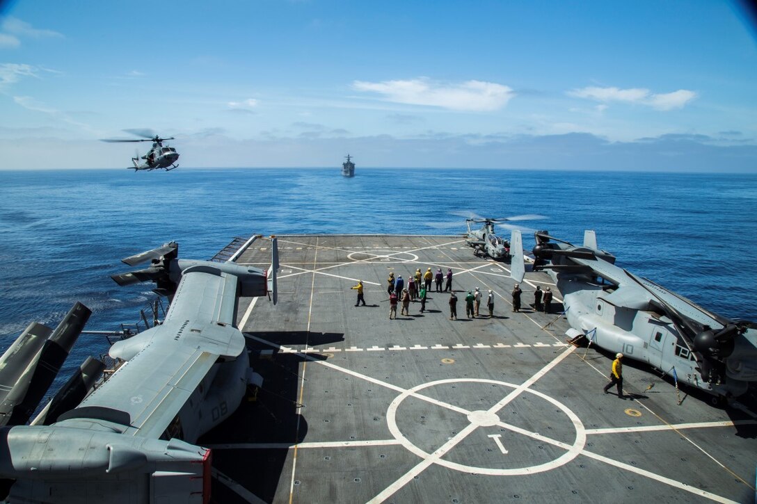 An AH-1Z Cobra with Marine Medium Wing Tilt Rotor Squadron 166 (VMM-166) lands on the USS New Orleans to refuel during the PHIBRON-MEU integration exercise aboard the USS New Orleans on Sept. 27, 2015. This marks the first at sea exercise for the PHIBRON-MEU Marines and Sailors as they work together in preparation for deployment to the Pacific and Central Command areas of responsibility in early 2016.