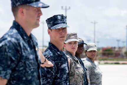 Airman Leadership School Class 15-F students participate in a drill exercise Aug. 18, 2015, at Andersen Air Force Base, Guam. ALS, a 192-hour course, spread across 24 days and is divided into three major academic curriculum areas that focus on developing leadership abilities, building effective communication and the profession of arms. (U.S. Air Force photo/Senior Airman Katrina M. Brisbin)