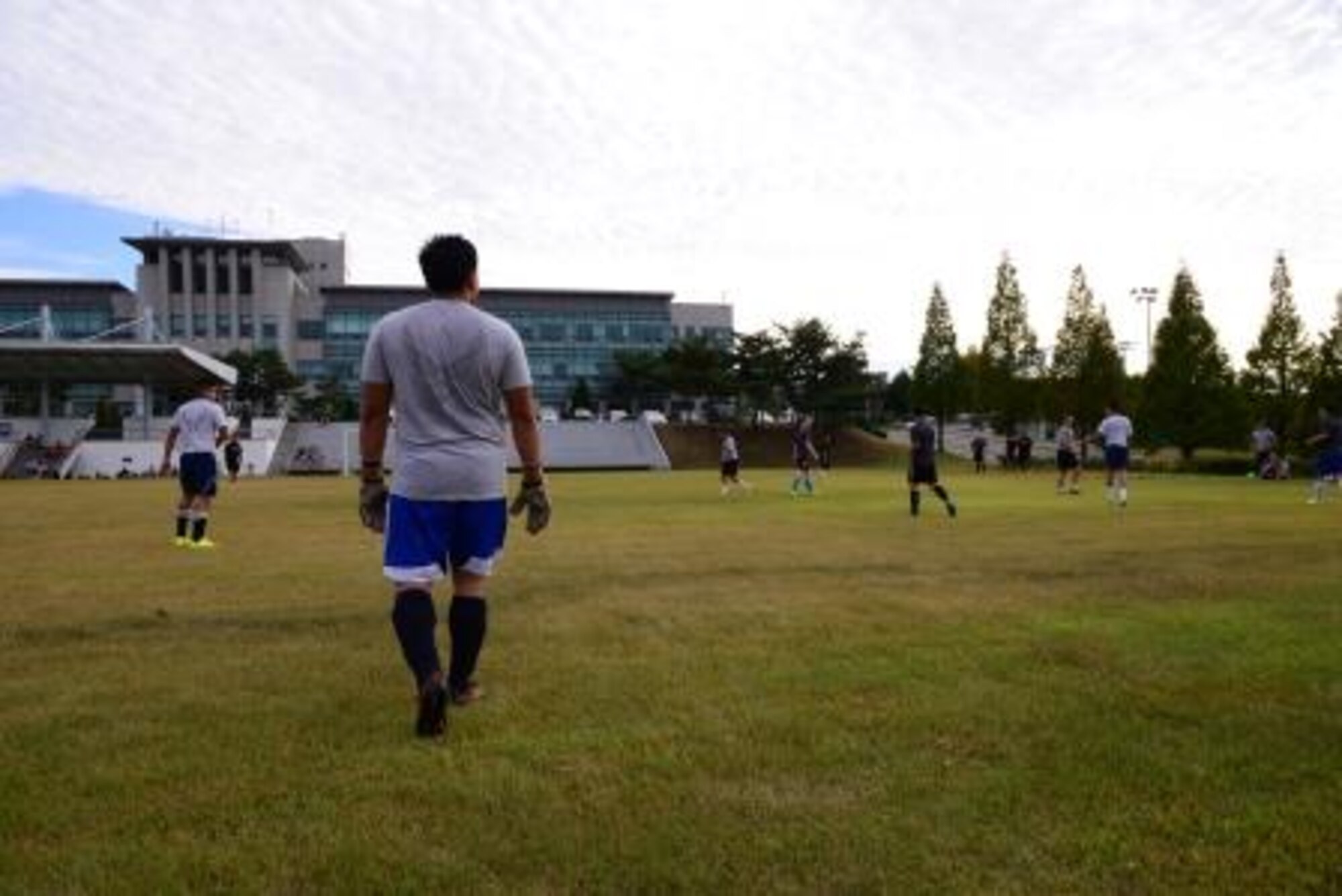Team Osan members play soccer during the second annual Osan Cup Sept. 29, 2015, at Osan Air Base, Republic of Korea. Many Team Osan members were able to ake a day off, play their favorite sport or game, and focus on resiliency during the two-day event. (U.S. Air Force photo by Staff Sgt. Benjamin Sutton)