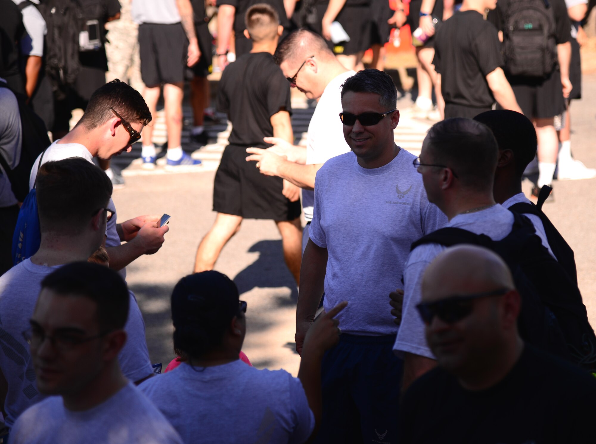 Members of the 51st Fighter Wing talk before the start of the Osan Cup Sept. 29, 2015, at Osan Air Base, Republic of Korea. The competition was held Sept. 29-30, and was open to all squadrons, groups, divisions, tenant units and other organizations assigned to Osan. (U.S. Air Force photo by Staff Sgt. Benjamin Sutton)