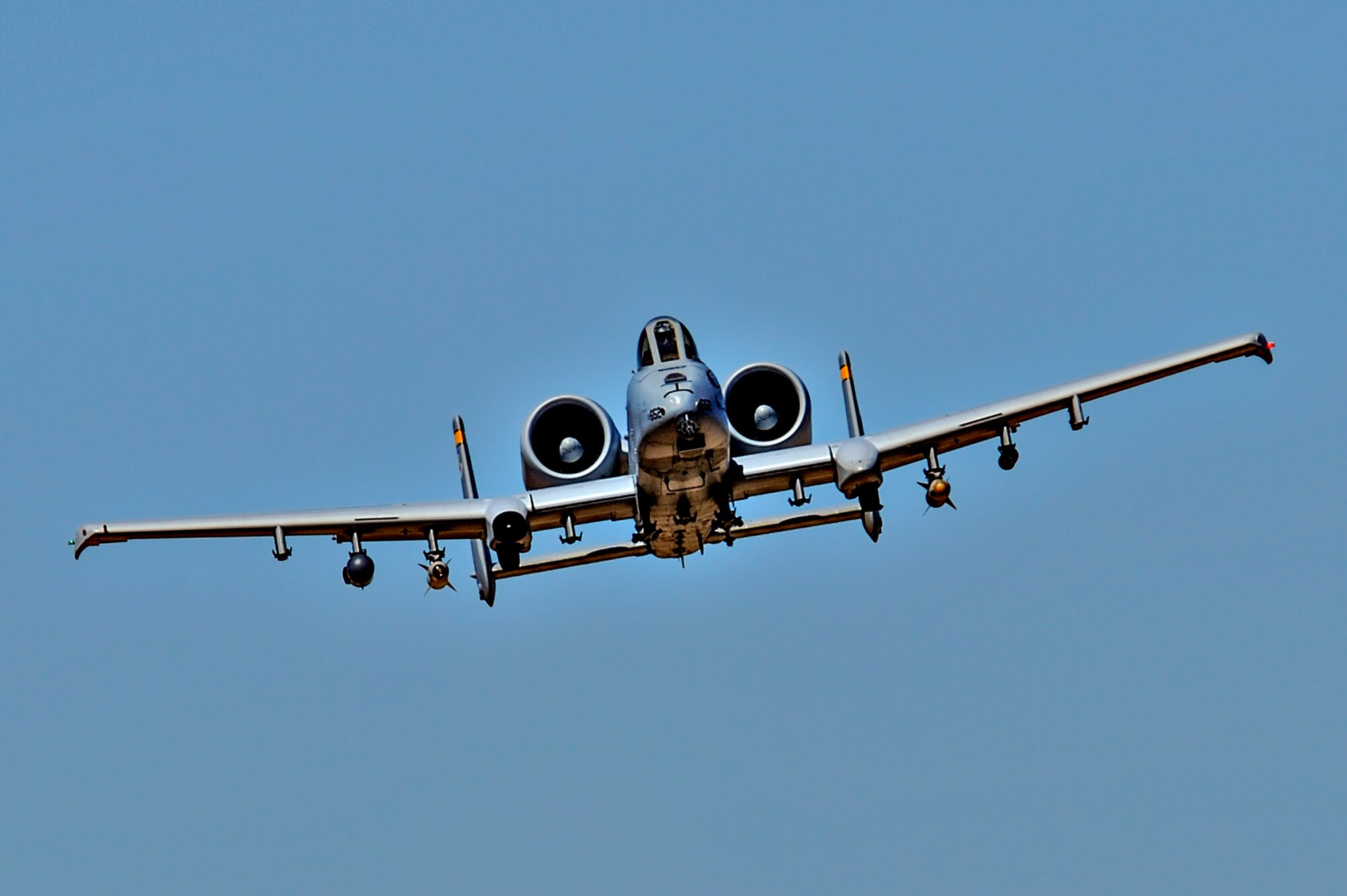 A U.S. Air Force A-10C Thunderbolt II assigned to the 357th Fighter Squadron flies while being directed by British Armed Forces joint tactical air controllers at Barry M. Goldwater Range, Ariz., Sept. 23, 2015. The frequent air traffic at BMGR provided the JTACs with a fast track to becoming more proficient in their career field. (U.S. Air Force photo by Airman 1st Class Chris Drzazgowski/Released)