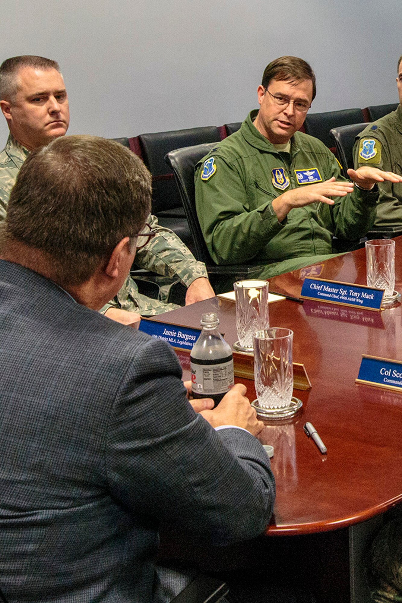 U.S. Rep. Denny Heck, of Washington's 10th District, listens to Col. Scott Snyder, the 446th Operations Group commander, brief him on 446th Reserve Airlift Wing C-17 operations, at McChord Field. Heck's purpose for visiting the Reserve unit was to get an update on the status of the wing. Various 446th members briefed the Congressman on medical service missions, and Operation Deep Freeze. (U.S. Air Force Reserve photo by Jake Chappelle)