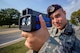 Staff Sgt. Eric Salazar monitors vehicle speeds at Vance Air Force Base, Oklahoma, Sept. 29. Salazar is a Defender with Vance's 71st Security Forces Squadron. (U.S. Air Force photo / David Poe)