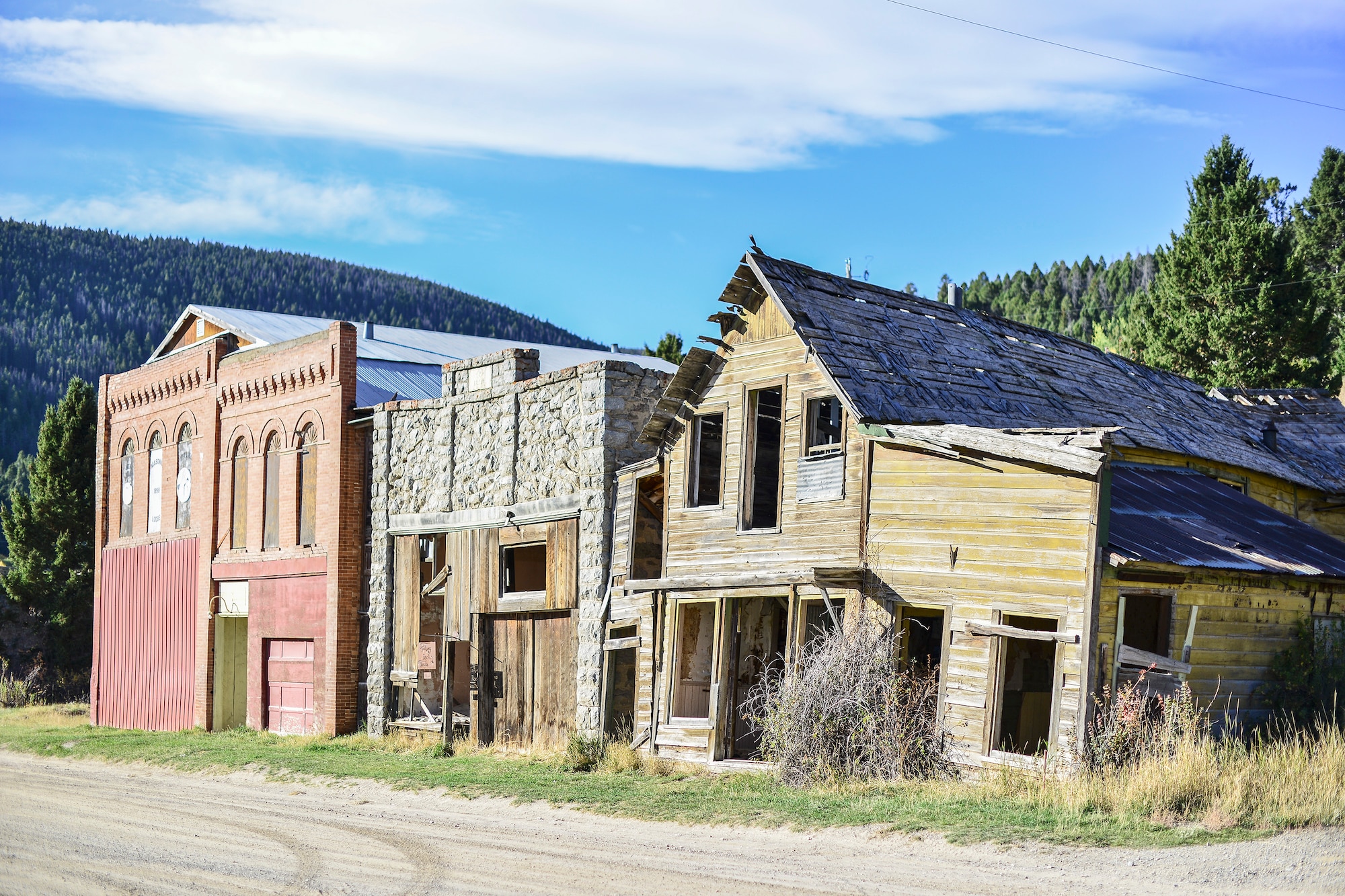 These three buildings greet are located at the entrance of Marysville, Mont. This once booming gold mining town was built and established around the Drumlummon Mine in 1876, by founder Thomas Cruse and was once one of the richest mining towns of its era. The Marysville mining district produced about $50 million in gold during its heyday. (U.S. Air Force photo/Tech. Sgt. Chad Thompson)