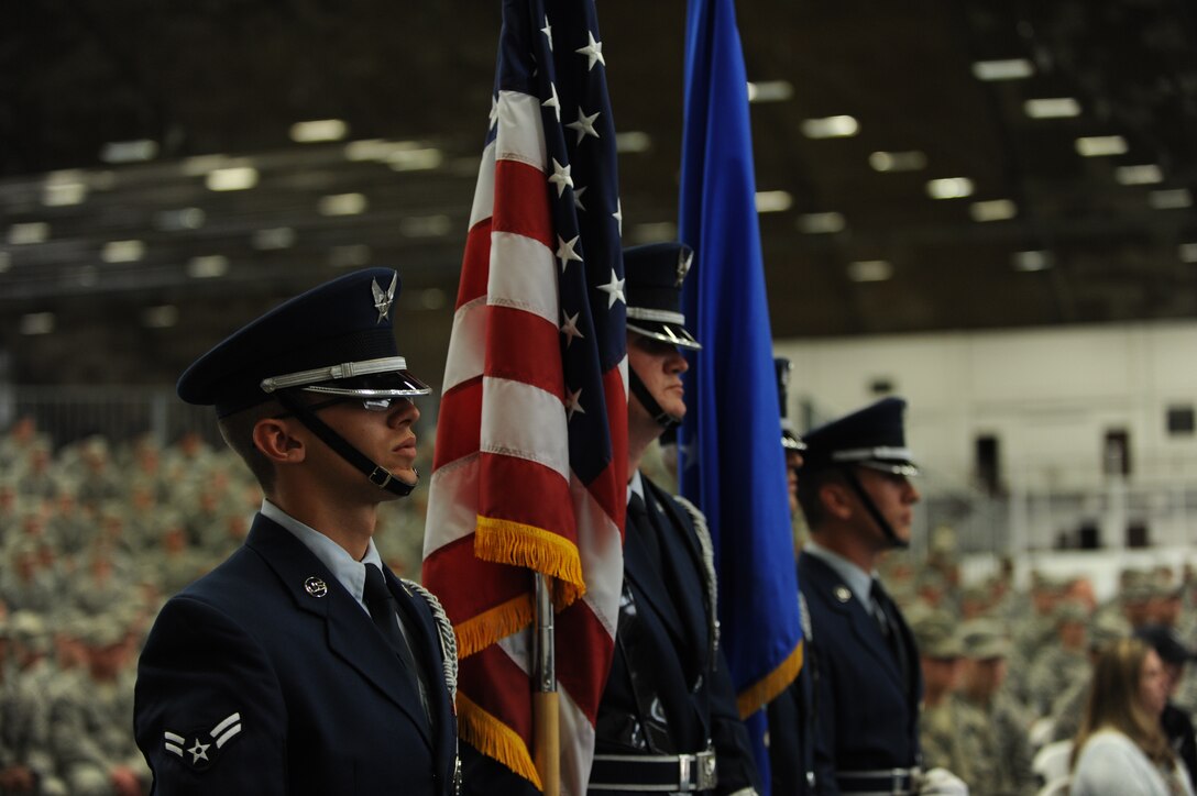 Honor Guardsmen from the 28th Bomb Wing prepare to present the colors at the B-1 realignment ceremony at Ellsworth Air Force Base, S.D., Sept. 28, 2015. The ceremony signified Ellsworth’s transition from Air Combat Command to Air Force Global Strike Command, realigning all Air Force bombers under one command. (U.S. Air Force photo by Airman Sadie Colbert/Released)