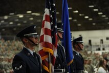 Honor Guardsmen from the 28th Bomb Wing prepare to present the colors at the B-1 realignment ceremony at Ellsworth Air Force Base, S.D., Sept. 28, 2015. The ceremony signified Ellsworth’s transition from Air Combat Command to Air Force Global Strike Command, realigning all Air Force bombers under one command. (U.S. Air Force photo by Airman Sadie Colbert/Released)