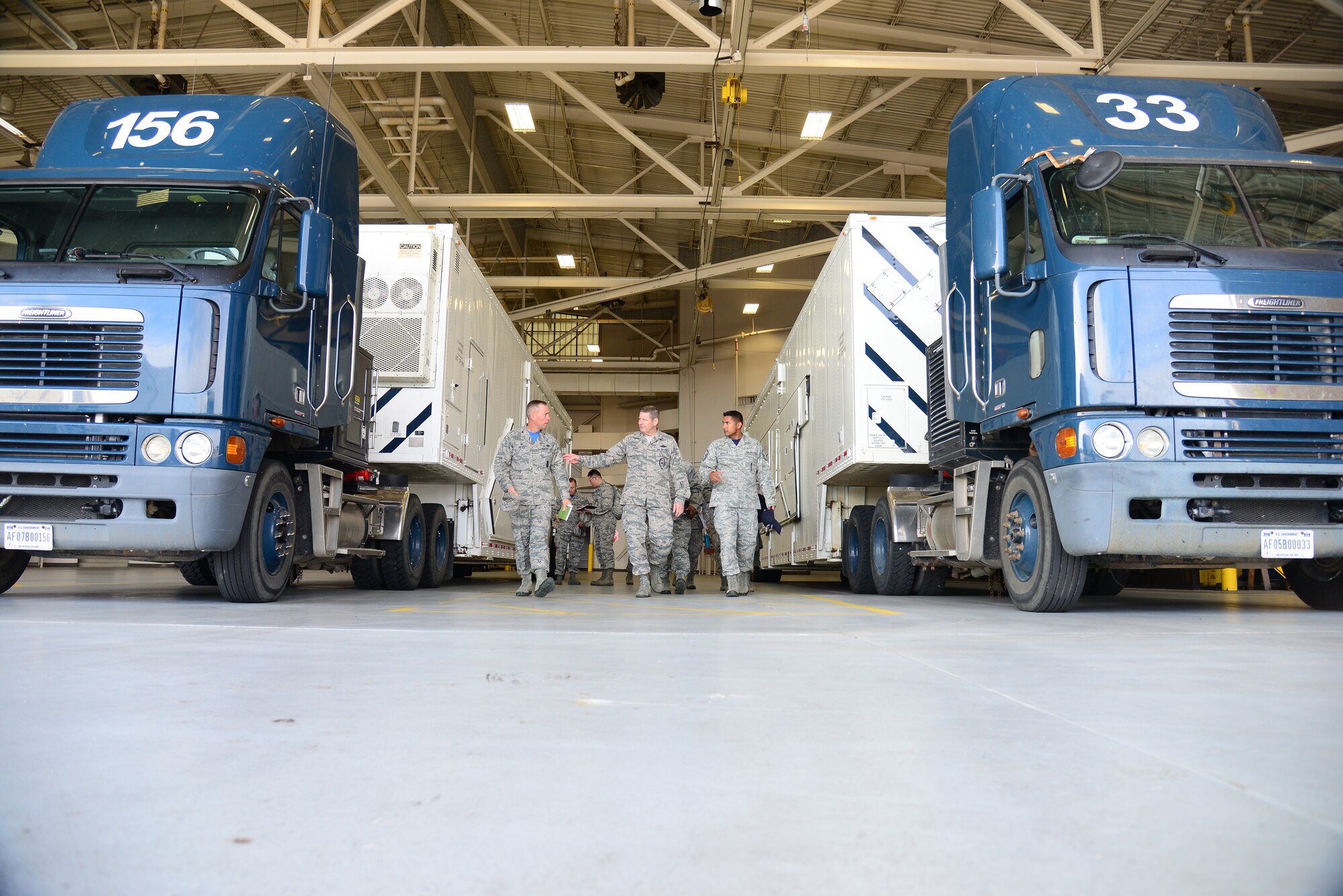 Gen. Robin Rand, AFGSC commander, center, Col. Tom Wilcox, 341st Missile Wing commander, left, and Master Sgt. Jorge Murillo, a 341st Maintenance Operations Squadron member, exit a maintenance building Sept. 25, 2015, at Malmstrom Air Force Base, Mont. Rand spent a portion of the day touring Malmstrom’s communications and maintenance squadrons during a base visit, Sept. 24-26. (U.S. Air Force photo/Airman 1st Class Magen M. Reeves)