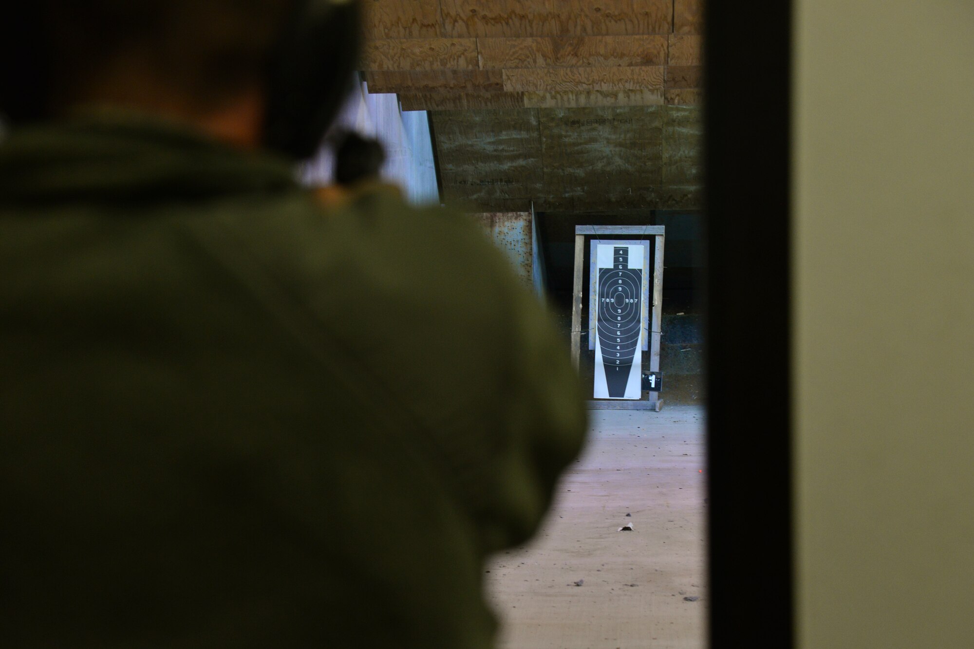 An Airman takes aim at a target during an Excellence in Competition Marksman Event, held at the base firing range Sept. 28-29 at Malmstrom Air Force Base, Mont. The competition was open to military personnel on the base, as well as Airmen from the Air National Guard. (U.S. Air Force photo/Airman Daniel Brosam)