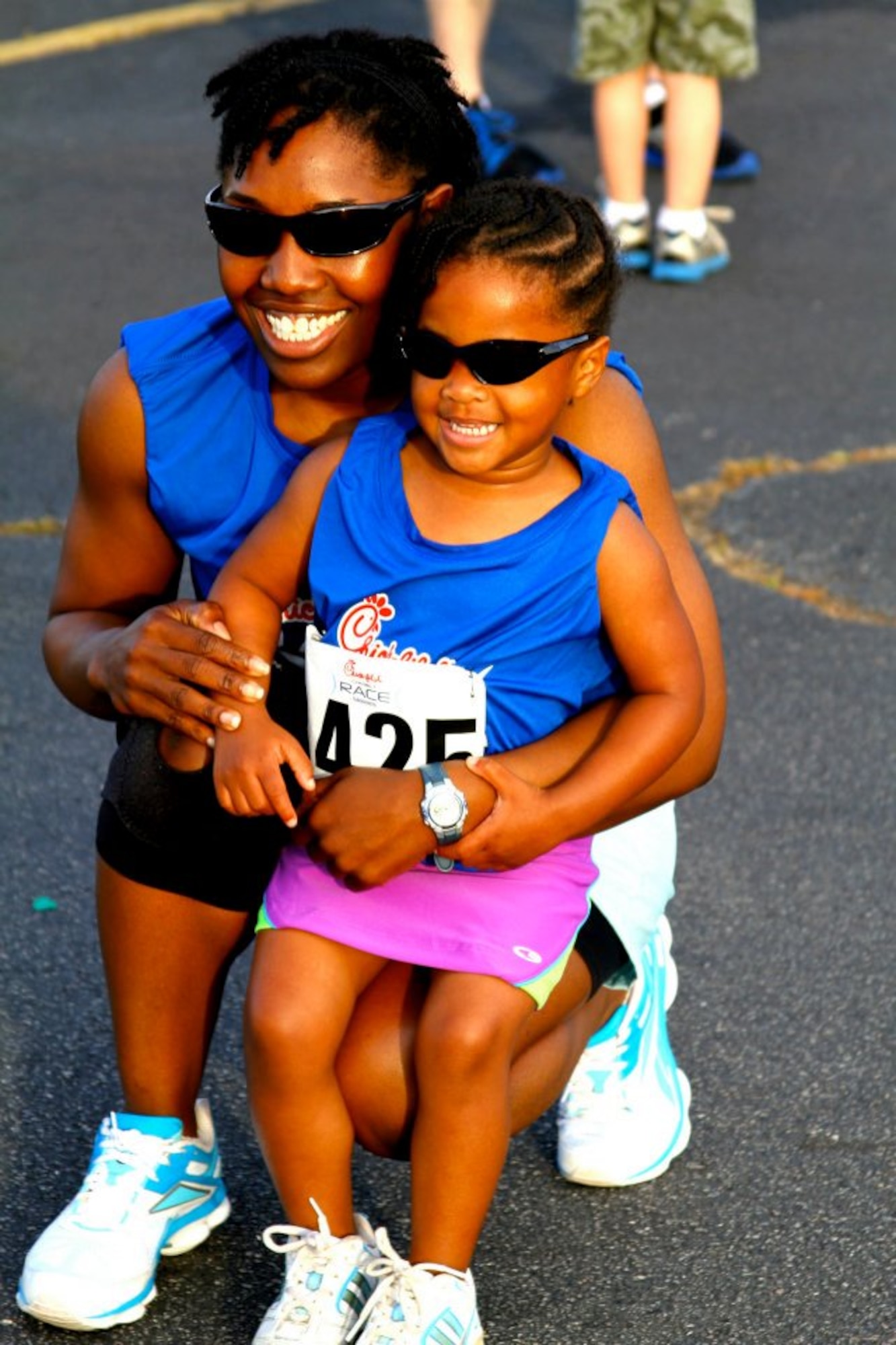 Tech. Sgt. Curnita Brisby, First-Term Airman Center NCO in charge, poses with her daughter, Joy Brisby, 6, after a race. Brisby and her daughter run together constantly and have participated in a number of 5Ks together. Joy motivates her mother to complete her races and was a huge support system from  home as Brisby completed the Air Force Marathon. (Courtesy photo)
