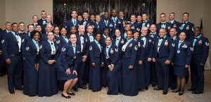 Joint Base Charleston’s newest Senior NCO’s gather for a group photo during the SNCO Induction ceremony Sept. 25, 2015, at the Charleston Club on JB Charleston – Air Base, S.C. This ceremony is a time honored tradition that recognizes Airmen making the transition from NCO to SNCO. (U.S. Air Force photo/Airman 1st Class Clayton Cupit)