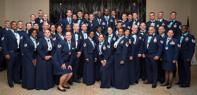 Joint Base Charleston’s newest Senior NCO’s gather for a group photo during the SNCO Induction ceremony Sept. 25, 2015, at the Charleston Club on JB Charleston – Air Base, S.C. This ceremony is a time honored tradition that recognizes Airmen making the transition from NCO to SNCO. (U.S. Air Force photo/Airman 1st Class Clayton Cupit)