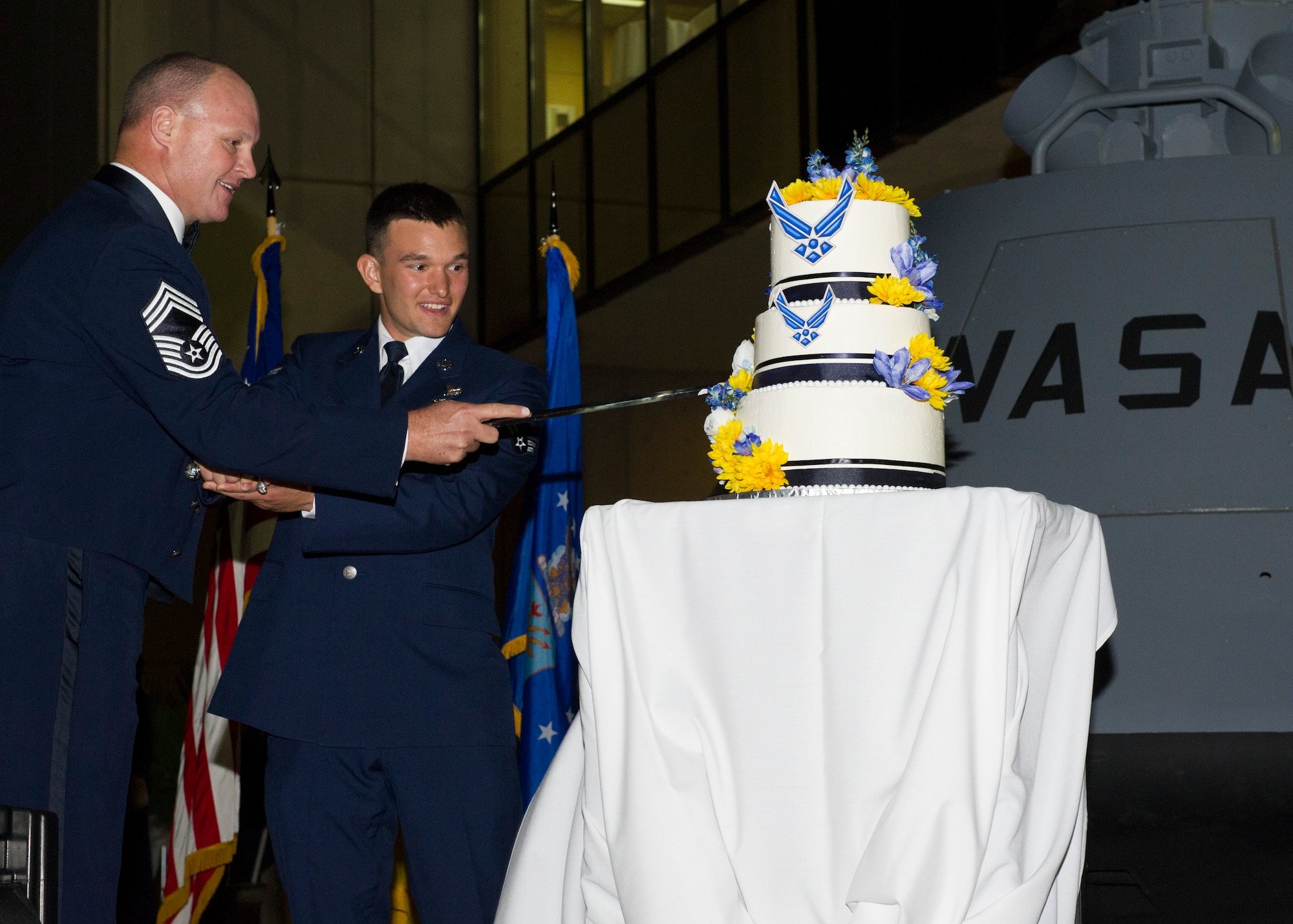 Chief Master Sgt. William Starling, the 49th Maintenance Group superintendent, and Airman 1st Class Benjamin Vetter cut the cake during the 68th Air Force Ball on Sept. 25. This year’s ball was held at the New Mexico Museum of Space History in Alamogordo N.M. and included a presentation from the fifth Chief Master Sergeant of the Air Force, Robert Gaylor. 