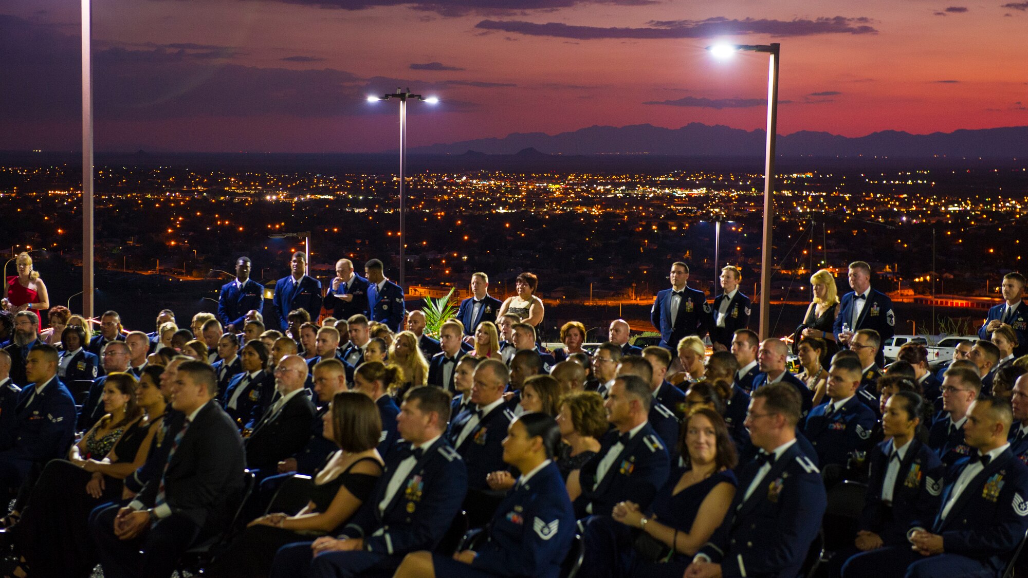 Attendees of the 68th Air Force Ball listen to the guest speaker the fifth Chief Master Sergeant of the Air Force, Robert Gaylor. During his presentation, he spoke about how the Air Force has evolved since he served. 
