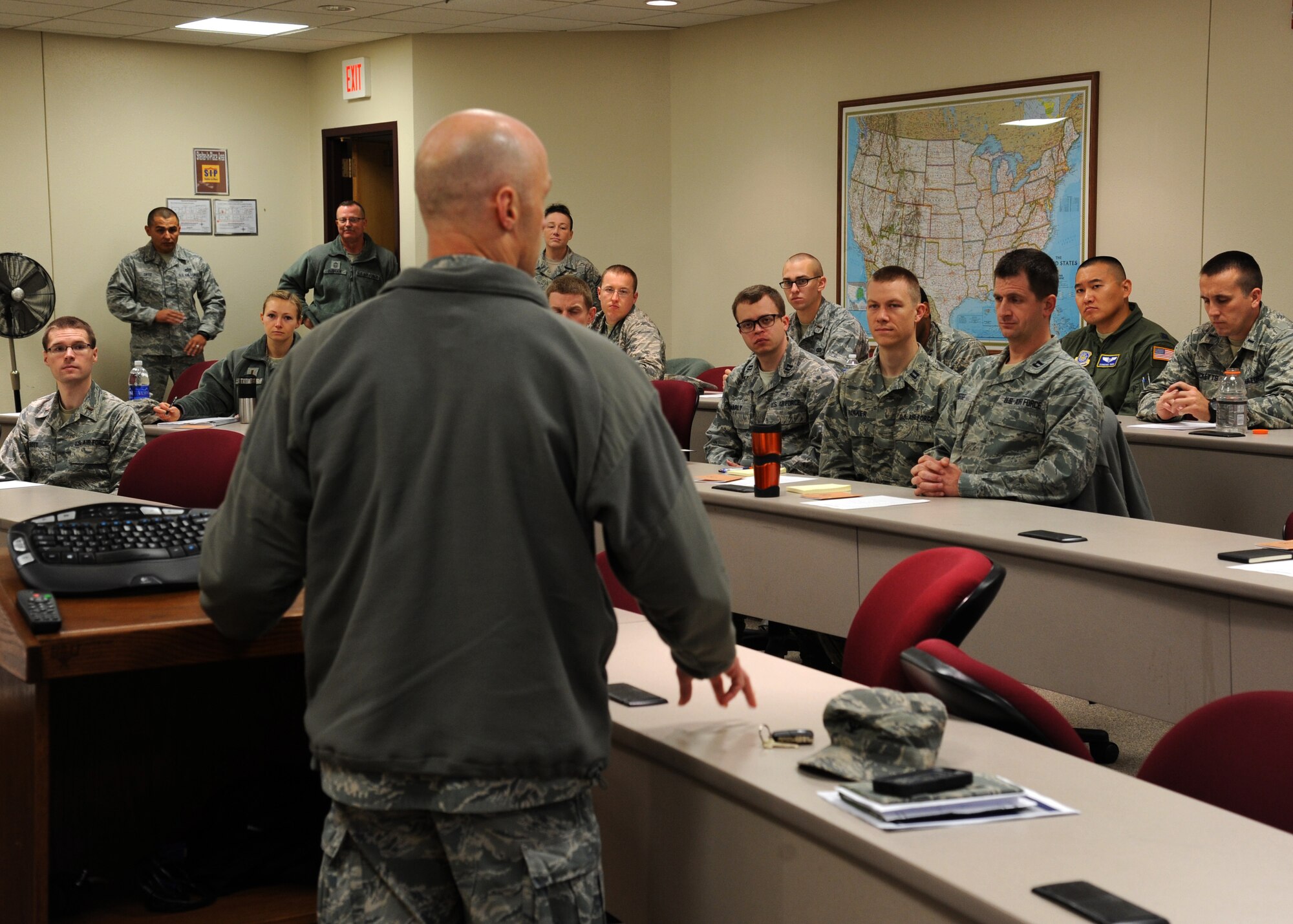 Col. Robert Cook, 319th Air Base Wing vice commander, addresses the Enlisted 101 class Sept. 29, 2015, on Grand Forks Air Force Base, North Dakota. Cook explained to the class how important it is to understand the enlisted force to be a better leader. The class consisted of company grade officers and focused on the enlisted force structure and other enlisted issues and obstacles. (U.S. Air Force photo by Airman 1st Class Ryan Sparks/Released)