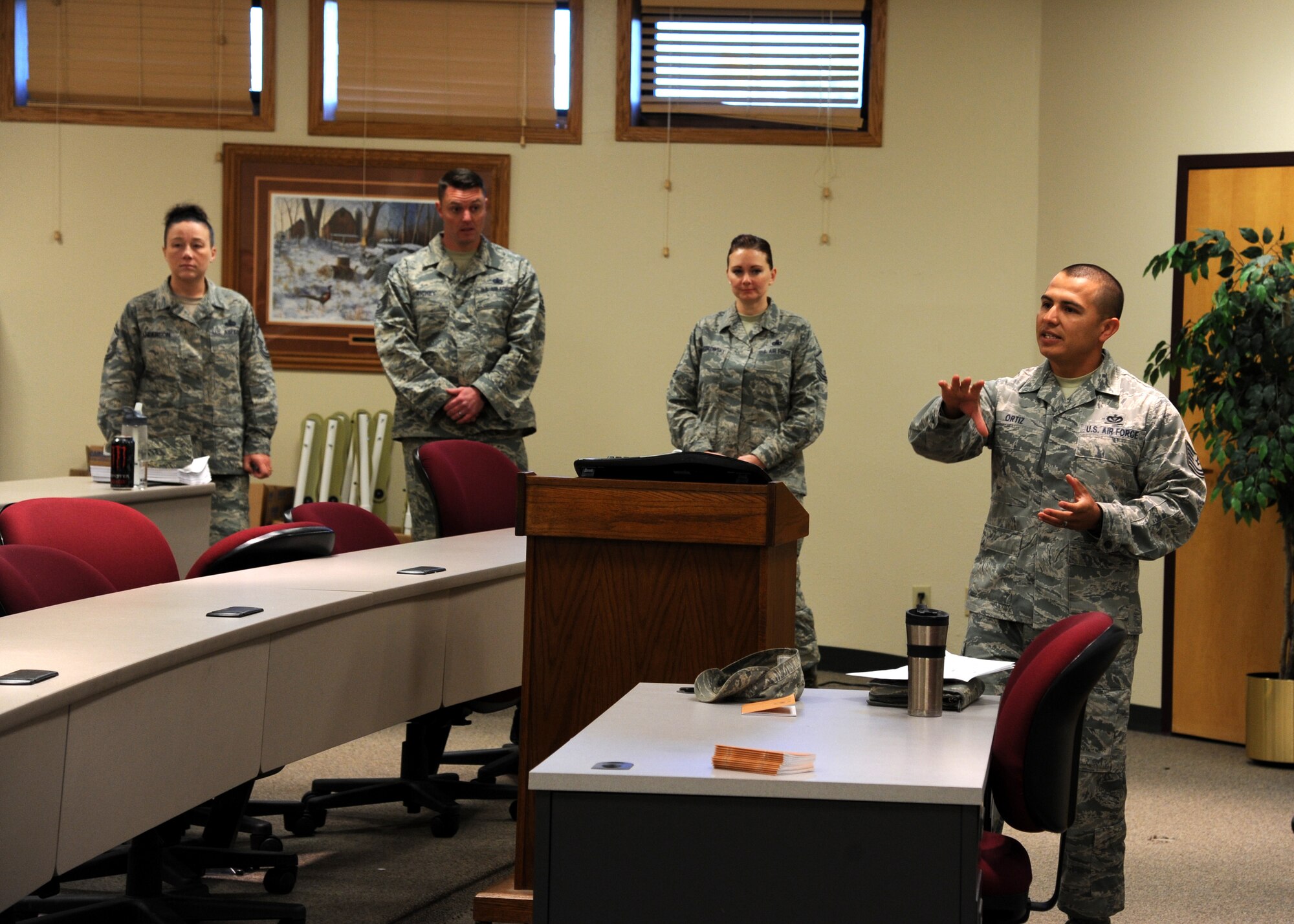 Tech. Sgt. Joseph Ortiz, 319th Civil Engineer Squadron electrical power production NCO-in-charge, introduces himself during the ?Enlisted 101? class Sept. 29, 2015, on Grand Forks Air Force Base, North Dakota. Ortiz is one of several NCOs and senior NCOs that teach a class about the enlisted force to company grade officers. (U.S. Air Force photo by Airman 1st Class Ryan Sparks/Released)