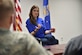 Taya Kyle speaks to Joint Base Andrews personnel and their families, Sept. 27, 2015. Kyle spoke about her experiences dealing with post-traumatic stress disorder. The goal of the Chris Kyle Frog Foundation is to provide meaningful, interactive experiences to service members, first responders and their families.   (U.S. Air Force photo/ Airman 1st Class J.D. Maidens)