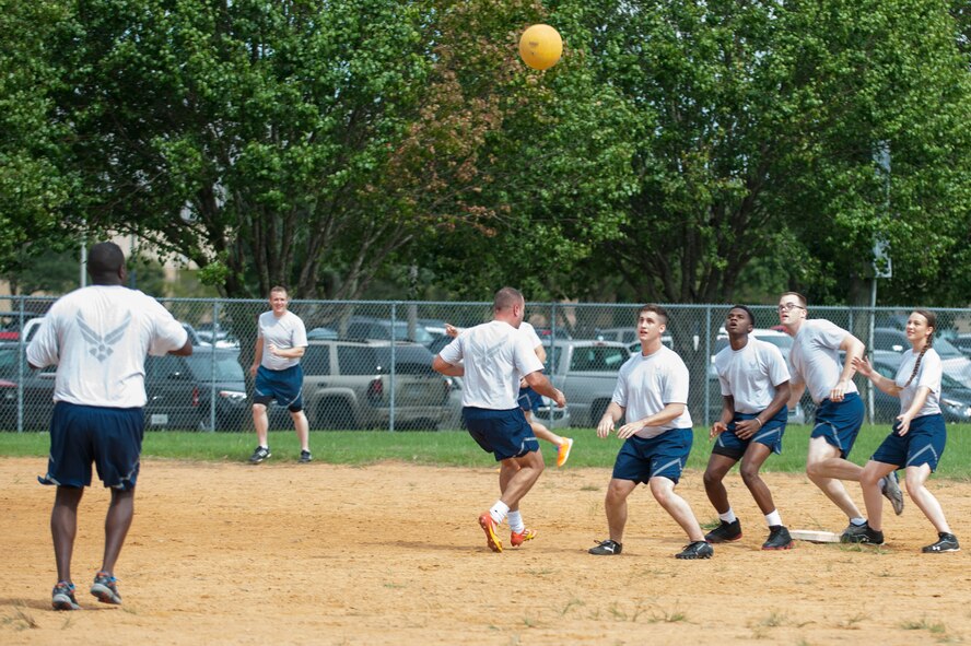 Airmen from the 23d Communications Squadron and the 23d Operations Support Squadron compete during a kickball tournament for Super Sports Day, Sept. 29, 2015, at Moody Air Force Base, Ga. Each sporting event was played tournament-style with multiple units competing for t-shirts and bragging rights. (U.S. Air Force photo by Airman 1st Class Kathleen D. Bryant/Released)


