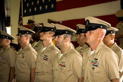 Newly selected Chiefs don their combination covers for the first time during the chief pinning ceremony held at the Nuclear Power Training Unit, Joint Base Charleston – Weapons Station, Sept 16, 2015. The ceremony welcomed 25 new members to the Chief’s Mess.  This is a significant milestone in every Sailor’s career, representing more than a century of heritage and tradition. (U.S. Navy photo/Machinist’s Mate Chief Petty Officer Justin D. Foil)