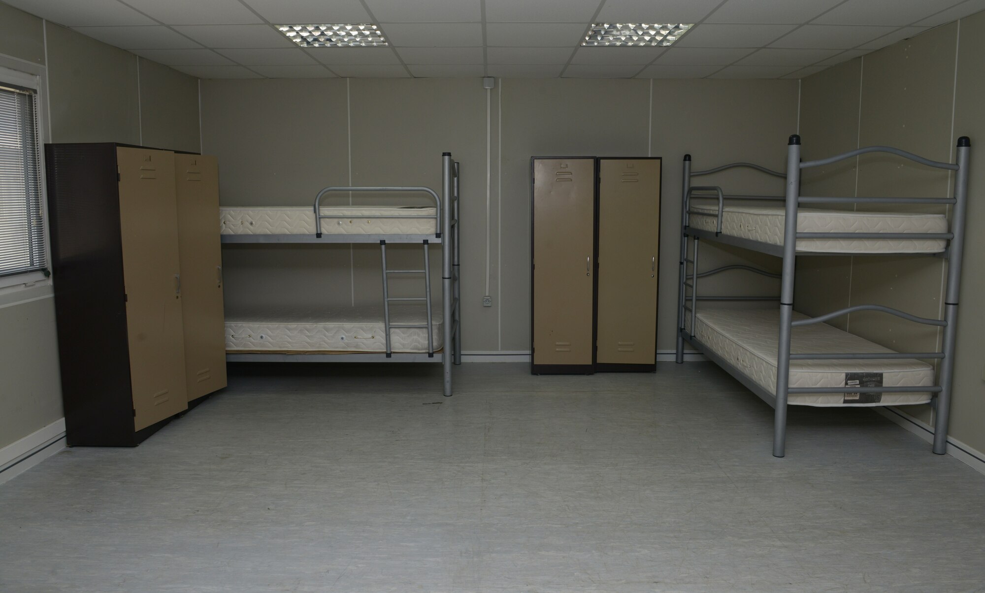 A room in Patriot Village is set up in an eight bed configuration Aug. 20, 2015, Incirlik Air Base, Turkey. Patriot Village is currently U.S. Air Forces in Europe’s largest contingency lodging arrangement and is capable of holding approximately 2,250 troops during surge capacity. (U.S. Air Forces photo by Senior Airman Krystal Ardrey/Released)