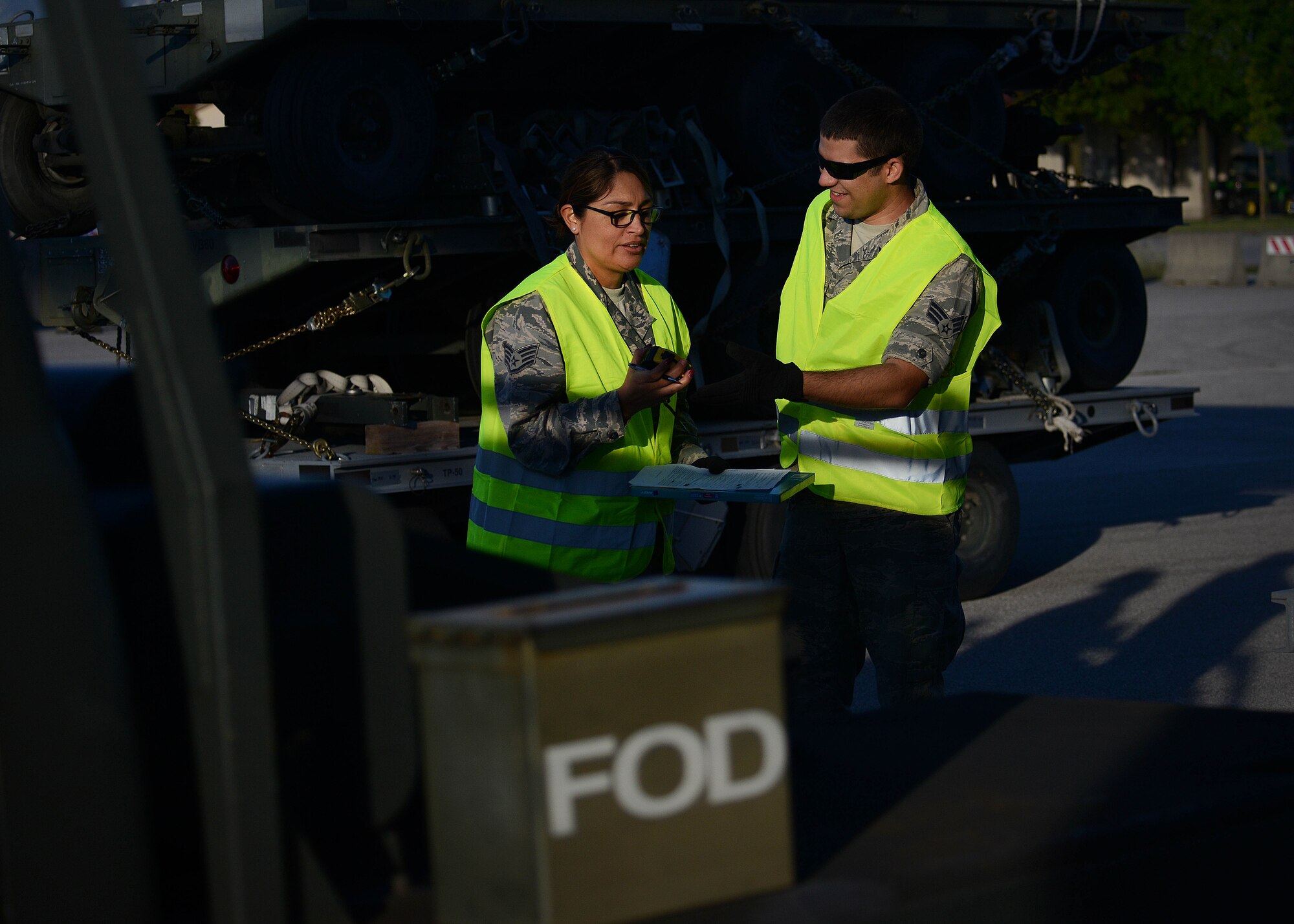 U.S. Air Force Staff Sgt. Maria De Leon and Senior Airman Lucas Jelinek, 31st Logistics Readiness Squadron traffic management office inbound cargo technicians, inspect cargo during a cargo rodeo, Sept. 29, 2015, at Aviano Air Base, Italy. Cargo rodeos are conducted twice a year to exercise the 31st Fighter Wing Deployment Control Center’s deployment readiness. (U.S. Air Force photo by Staff Sgt. Evelyn Chavez/Released)
