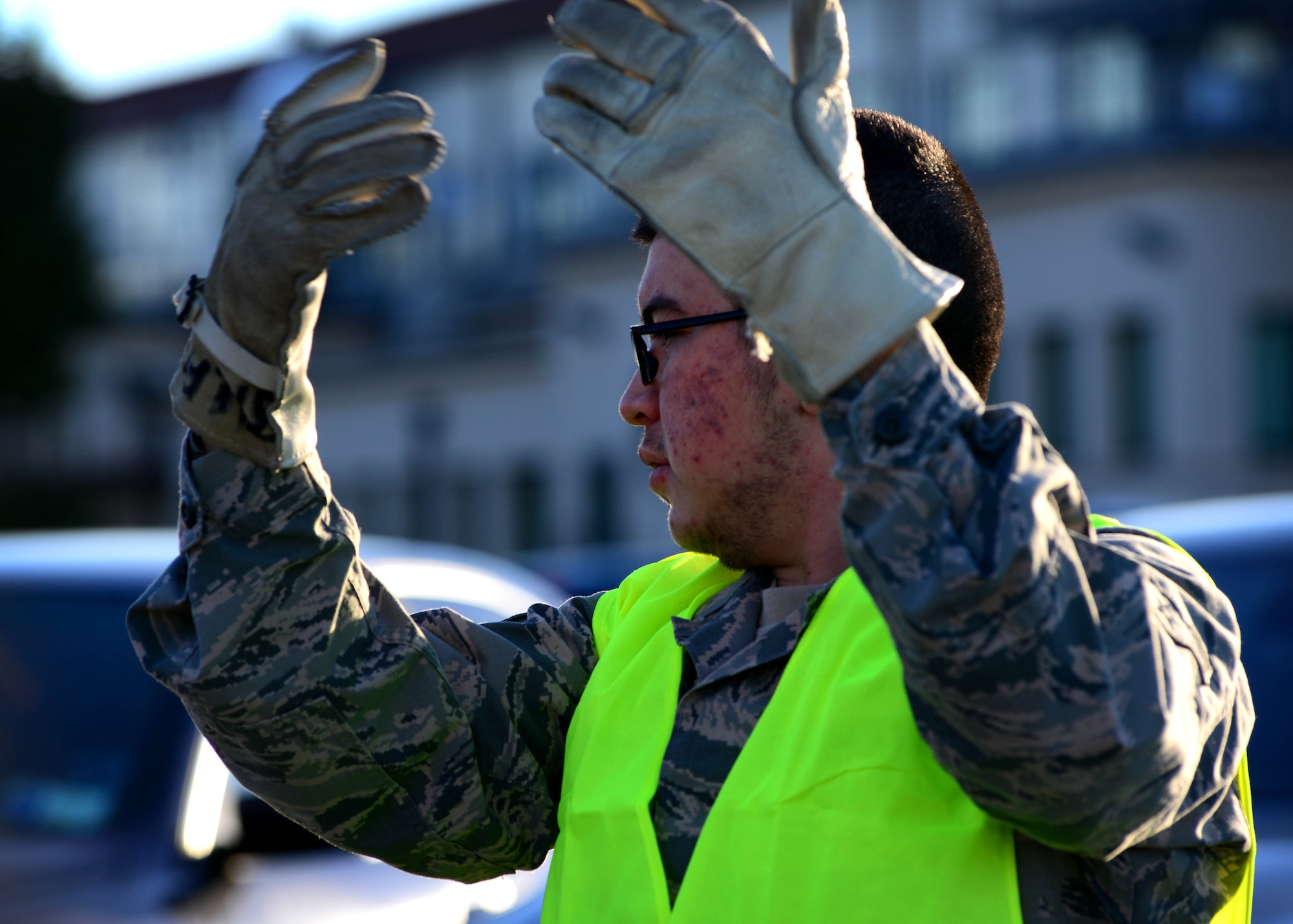 U.S. Air Force Airman 1st Class Aaron Cardenas, 31st Logistics Readiness Squadron flight service center apprentice, directs a forklift during a cargo rodeo, Sept. 29, 2015, at Aviano Air Base, Italy. Cargo rodeos are conducted twice a year to exercise the 31st Fighter Wing Deployment Control Center’s deployment readiness. (U.S. Air Force photo by Senior Airman Areca T. Bell/Released)