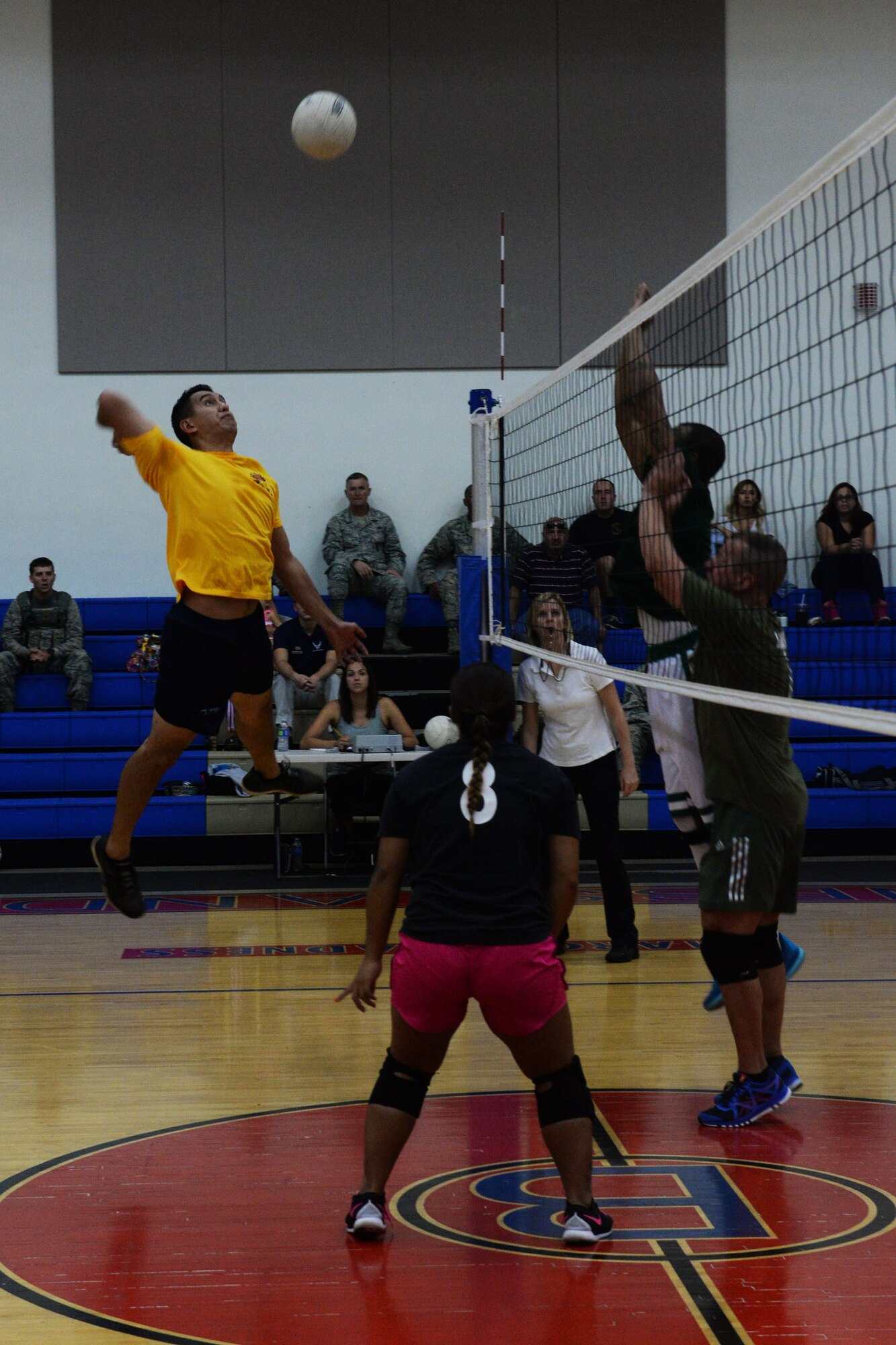 James Dela Pena, 36th Operations Support Squadron, attempts to spike a ball during the 2015 intramural volleyball championship game Sept. 29, 2015, at Andersen Air Force Base, Guam. Airmen assigned to the 36th Security Forces Squadron took home the first place trophy after winning the tiebreaker set 15-7. (U.S. Air Force by Senior Airman Joshua Smoot/Released)
