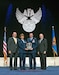 Col. Susan Melton and Lt. Col. Robert Taylor accept the Air Force Association Air National Guard Outstanding Unit Award for the 151st Maintenance Group at a ceremony in National Harbor, Md. on Sept. 14, 2015. (Photo by Brittany Gray/Released)