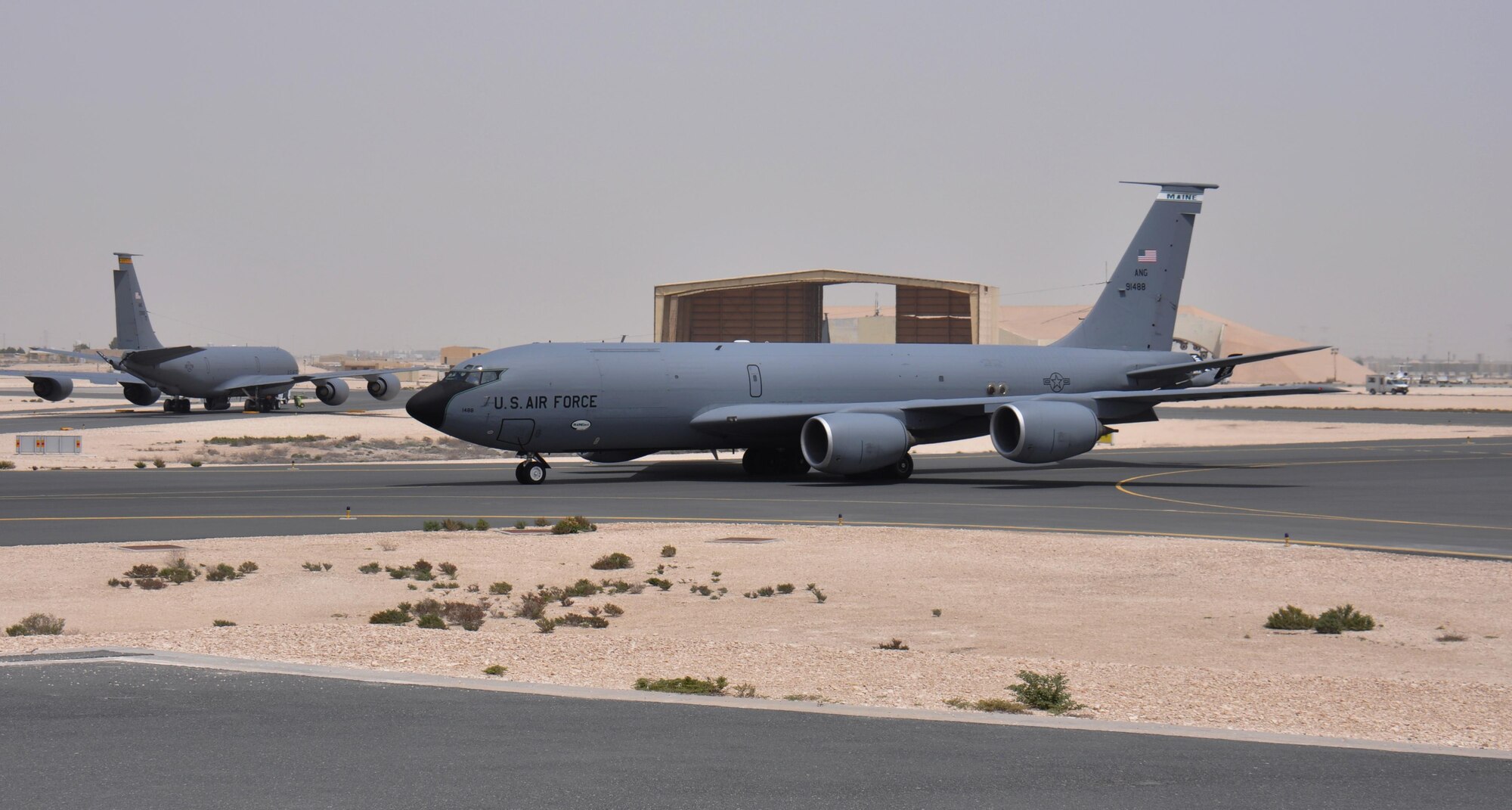 A KC-135 Stratotanker taxis to the runway at Al Udeid Air Base, Qatar March 27. Ensuring aircraft, like the one pictured here, take-off safely is one of the many responsibilities of the 379th Operations Support Squadron’s Airfield Management team. The team inspects AUAB’s airfield every day, more than 49 million square feet of pavement. Any discrepancies that could interfere with flying operations are reported and dealt with quickly. In 2015, the 379 EOSS Airfield Management team supported more than 20,000 sorties. (U.S. Air Force photo by Tech. Sgt. James Hodgman/Released)