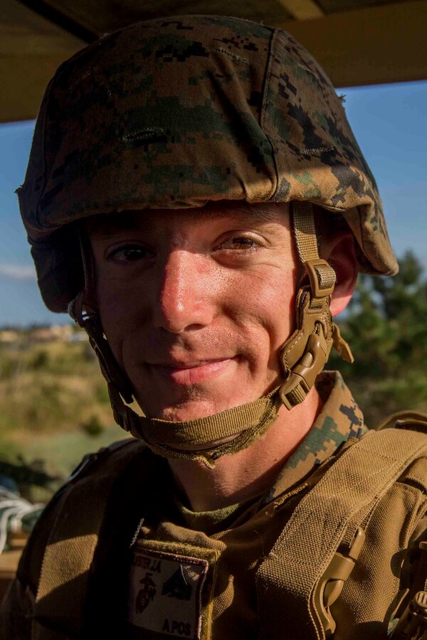 U.S. Marine Corps Cpl. Jesse A. Sylvester, a trombone instrumentalist with the III Marine Expeditionary Force band, gets his picture taken during CPX 16 on Okinawa, Japan, Jan. 31, 2016. CPX 16 is conducted to improve the III MEF capabilities in intelligence and logistic operations, future planning, and combat readiness. (U.S. Marine Corps photo by MCIPAC Combat Camera Lance Cpl. Juan Bustos/ Released)
