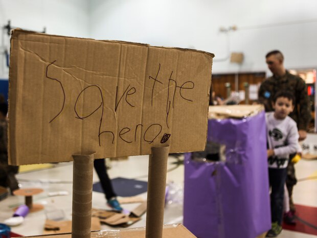 Students at DeLalio Elementary School participate in the Cardboard Box Challenge, a global Science, Technology, Engineering and Math education event, March 10. After creating an arcade out of cardboard and other recyclable materials, the students invited friends in family to come play the games.
