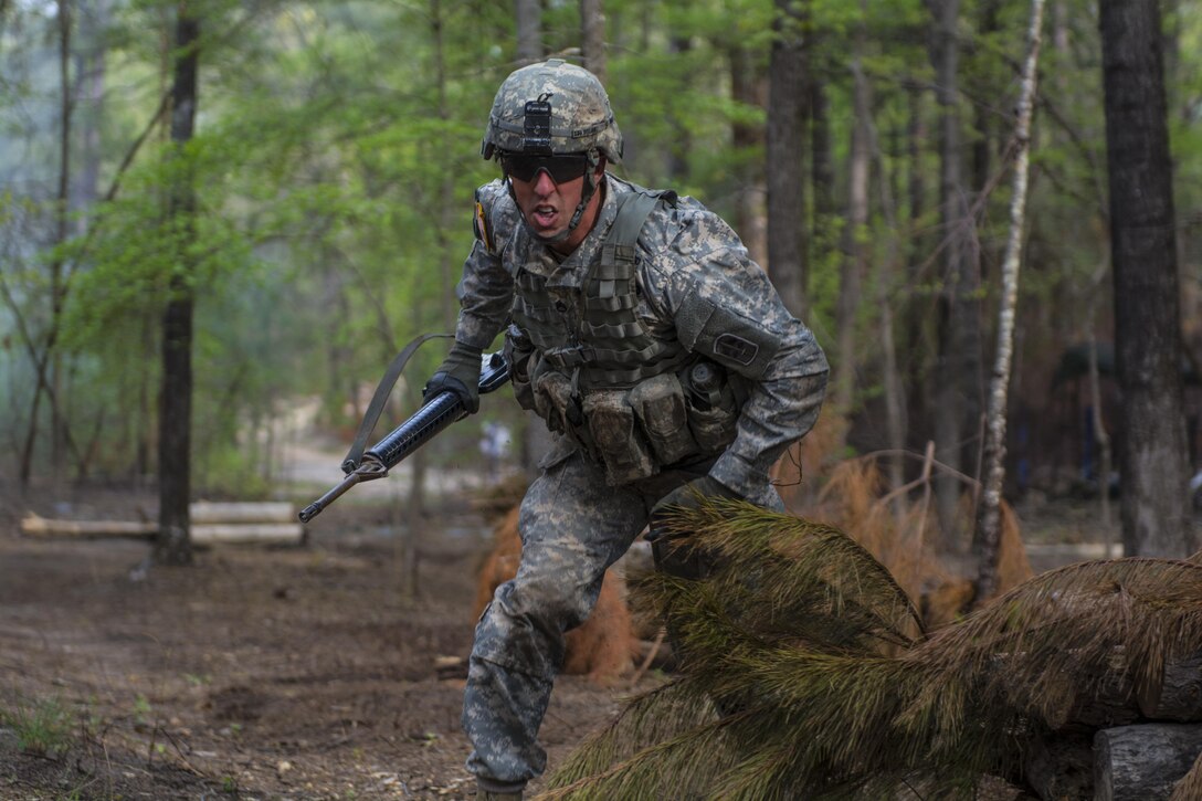 Staff Sgt. Brian Dolan, Co. B, Special Troops Bn., 171st Inf. Bde., rushes to his next position during while taking direct fire on the third day of testing at the Expert Infantry Badge qualification held on Ft. Jackson, S.C., March 31, 2016. Soldiers vying for the coveted Infantry qualification were given 30 timed Army Warrior tasks to complete in addition to being tested on the Army Physical Fitness test, day and night land navigation. Testing ends on April 1 with a 12-mile forced march. (U.S. Army photo by Sgt. 1st Class Brian Hamilton/released)