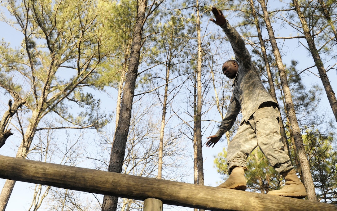 U.S. Army Sgt. Wayne Jones of Gainesville, Ga., a team leader with the 461st Human Resources Company, navigates an obstacle during the 642nd Regional Support Group's Best Warrior Competition at Fort McClellan, Ala., Feb. 18. (U.S. Army photo by Sgt. 1st Class Gary A. Witte, 642nd Regional Support Group)