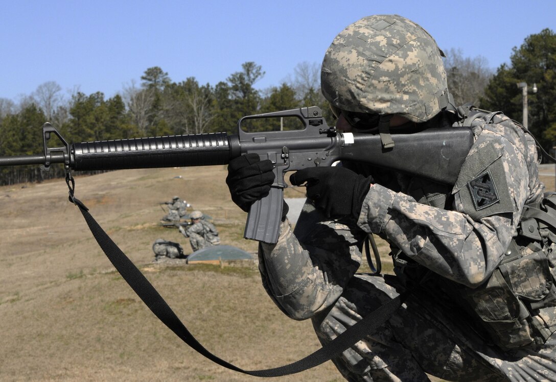 U.S. Army Sgt. Kevin E. Graney of Pemberton, N.J., lead mechanic for the 352nd Combat Sustainment Support Battalion, fires on the rifle qualification course as part of the 642nd Regional Support Group's Best Warrior Competition at Fort McClellan, Ala., Feb. 18. (U.S. Army photo by Sgt. 1st Class Gary A. Witte, 642nd Regional Support Group)