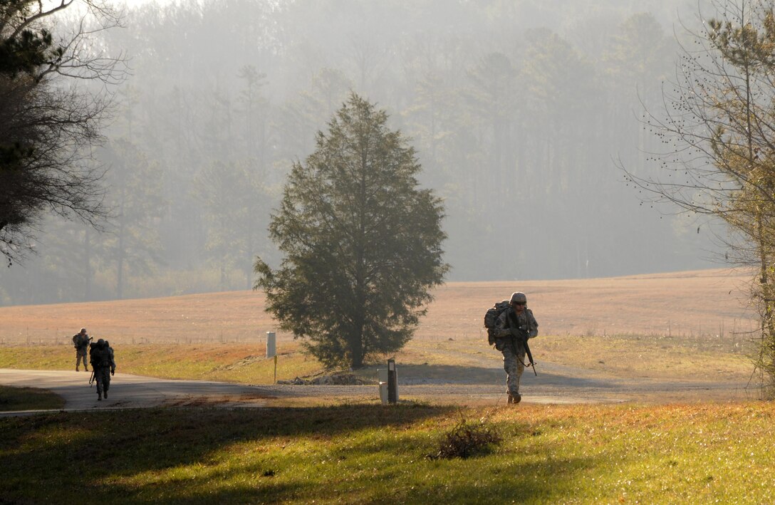 U.S. Army Reserve Soldiers conduct a 12-mile ruck march during the 642nd Regional Support Group's Best Warrior Competition at Fort McClellan, Ala., Feb. 18. The brigade-level competition tested the Soldiers' military skills, knowledge and fitness. (U.S. Army photo by Sgt. 1st Class Gary A. Witte, 642nd Regional Support Group)