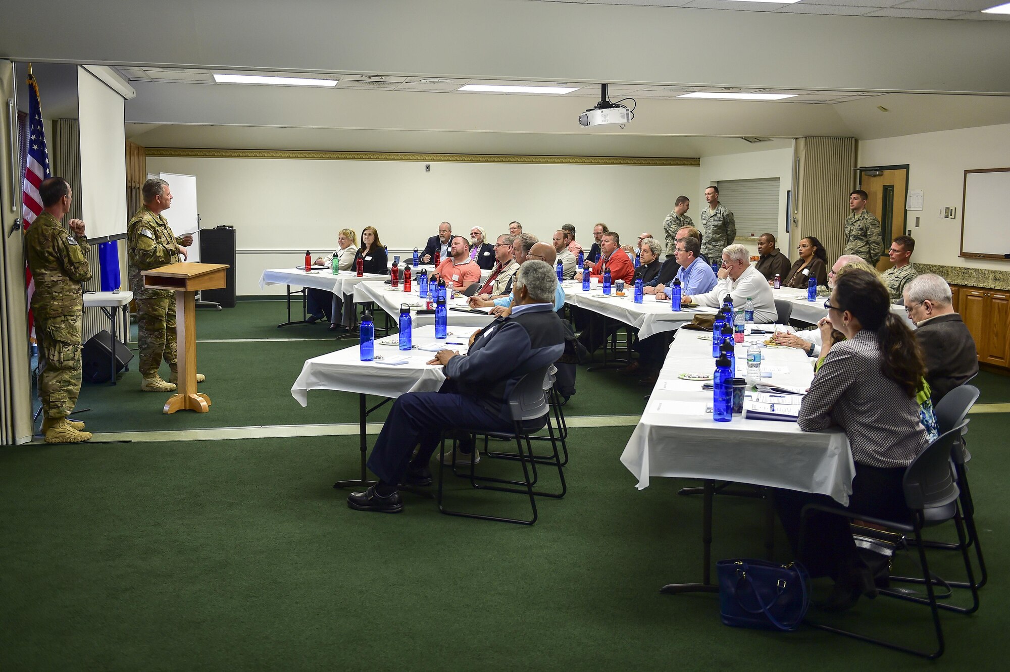 Attendees of the annual Clergy Day listen to a briefing from Chaplain (Col.) John Ditter, the command chaplain with Air Force Special Operations Command, at Hurlburt Field, Fla., March 29, 2016. Clergy Day is an event when local clergy members and faith leaders are invited to Hurlburt to receive information on topics that could affect military members of their churches. (U.S. Air Force photo by Senior Airman Jeff Parkinson)