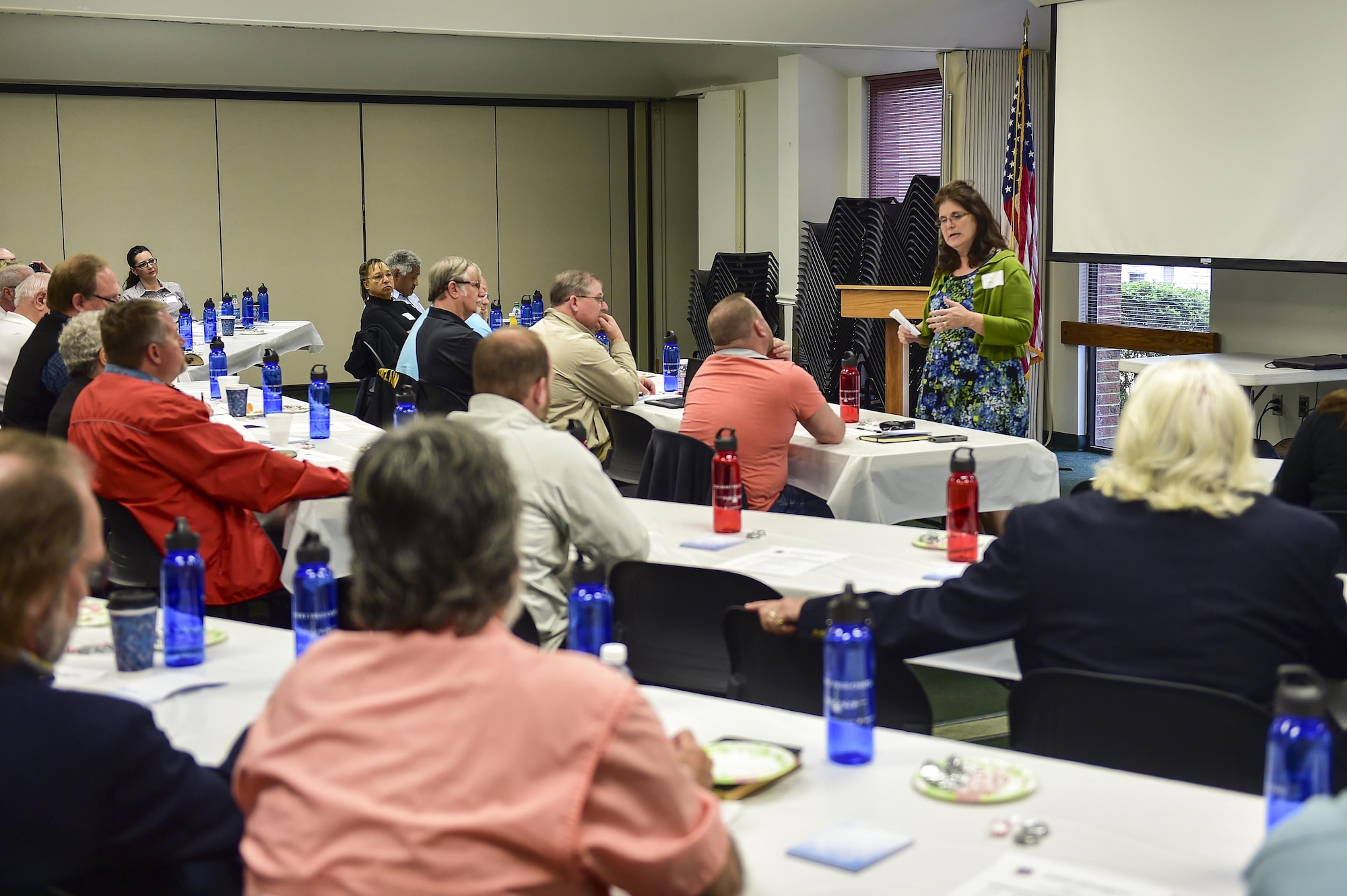 Carol Andrus, a Preservation of the Force and Family representative with the 1st Special Operations Maintenance Group, briefs Clergy Day attendees on post-traumatic stress disorder at Hurlburt Field, Fla., March 29, 2016. Andrus explained ways to identify PTSD to clergy and faith leaders in attendance. (U.S. Air Force photo by Senior Airman Jeff Parkinson)