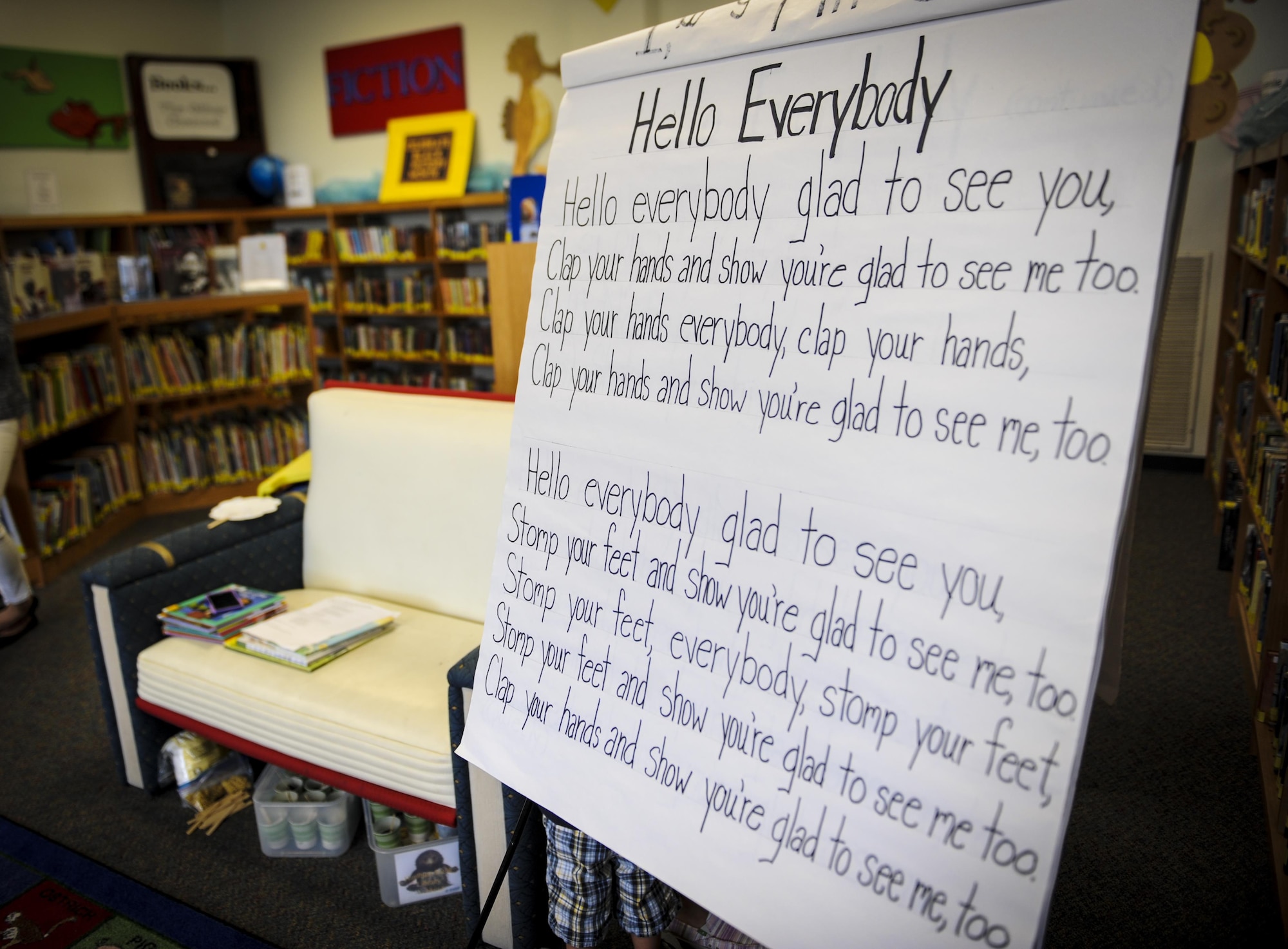 A welcome sign displaying a song is posted for visitors in the children’s section at the library, Hurlburt Field, Fla., March 31, 2016. Every Thursday, the library hosts a reading time with a guest speaker who reads to children. This event enables parents to network and helps children work on literacy skills, fine motor capabilities and social skills. (U.S. Air Force photo by Senior Airman Meagan Schutter)