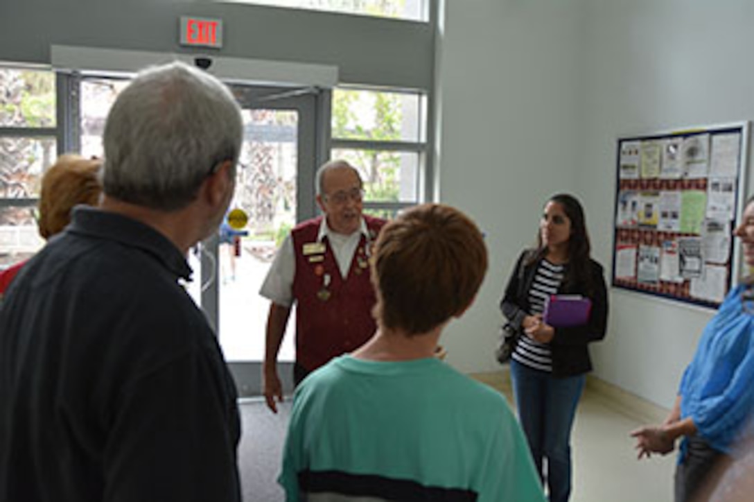 Tony Meyer, a 30-year Navy veteran, serves as tour guide for a group at the Center for the Intrepid in San Antonio, Texas, March 23, 2016. Meyer, a Brooke Army Medical Center volunteer since 2004, was named Office of Volunteer Services’ Volunteer of the Year for BAMC and will now vie for honors at the JBSA-Fort Sam Houston and San Antonio United Way levels. Army photo by Robert T. Shields