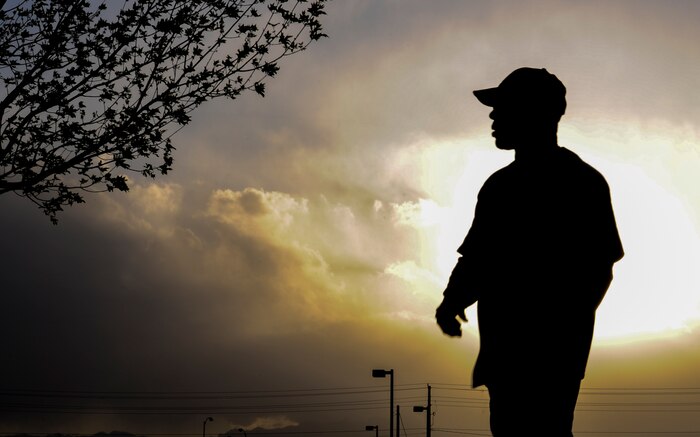 A member of the 57th Operations Support Squadron team warms up before the first intramural game against the 30th Reconnaissance Squadron at Nellis Air Force Base, Nev., March 29, 2016. Outside of an intramural sports league, Nellis AFB is pushing to have a varsity softball team, in hopes of playing with other military installations and teams in downtown Las Vegas. (U.S. Air Force photo by Airman 1st Class Kevin Tanenbaum)