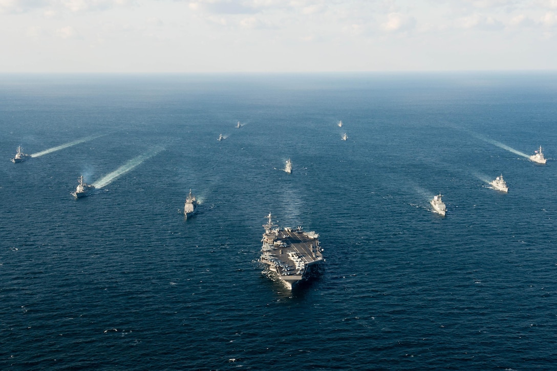 U.S. and South Korean naval ships traverse the ocean in formation as part of Foal Eagle 2016 in the waters surrounding the Korean peninsula, March 24, 2016. The training exercise is designed to enhance the readiness of the two forces. The U.S. ships are assigned to the John C. Stennis Carrier Strike Group. Navy photo by Petty Officer 3rd Class Andre T. Richard