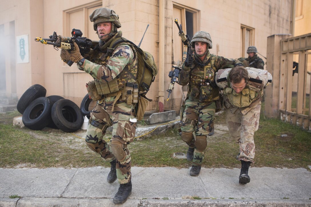 A Marine plays the role of a captured insurgent during an urban training exercise involving U.S. Marines and Dutch Marines on Camp Lejeune, N.C., March 24, 2016. The exercise helped the Marines learn new techniques and develop working relations between partner nations. Marine Corps photo by Cpl. Christopher A. Mendoza