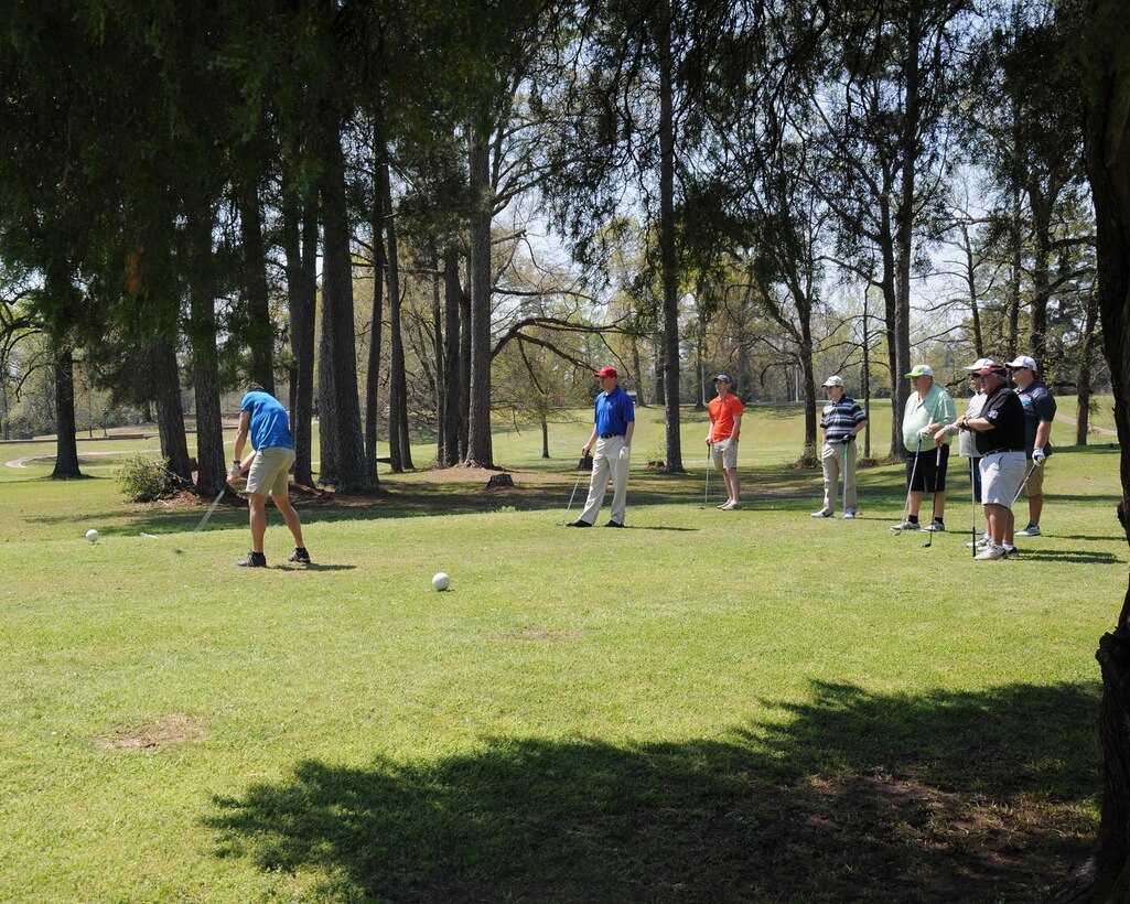 Participants tee off at the start of the Happy Irby Golf Tournament March 25 at the Golf Course on Columbus Air Force Base, Mississippi. The tournament raises money for the Happy Irby Christmas Fund which provides support to Columbus residents during the holiday season. The tournament raised over $6,000 and had over 50 participants. (U.S. Air Force photo/Sharon Ybarra)