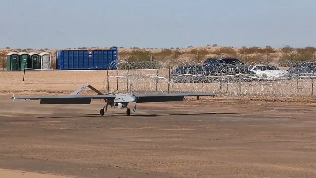An RQ-7Bv2 Shadow lands after its first flight at the Cannon Air Defense Complex in Yuma, Ariz., March 26. The Marines with Marine Wing Support Squadron (MWSS) 371 and MWSS-274 supported Marine Unmanned Aerial Vehicle Squadron (VMU) 1 by building a runway in preparation for the first flight of the Shadow at the site. (U.S. Marine Corps photo by Sgt. Travis Gershaneck /Released)