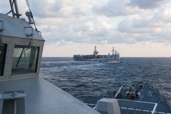 160324-N-ZH960-060 WATERS SURROUNDING THE KOREAN PENNINSULA (March 24, 2016)  The guided-missile cruiser USS Mobile Bay (CG 53) and guided-missile destroyer USS Stockdale (DDG 106) steam in formation with USS John C. Stennis (CVN 74) during Maritime Counter Special Operations Force (MCSOF) exercise, which is part of Foal Eagle 2016. Foal Eagle is an annual bilateral training exercise designed to enhance the readiness of U.S. and Republic of Korea forces and their ability to work together during a crisis.  Providing a ready force supporting security and stability in the Indo-Asia-Pacific, Stockdale is operating as part of the John C Stennis Strike Group and Great Green Fleet on a regularly scheduled 7th Fleet deployment. (U.S. Navy photo by Mass Communication Specialist 2nd Class Andrew P. Holmes/Released)