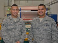 Senior Airman Carlos Taveras, left, a structural maintenance apprentice, disassembles a mandrel from a tube bender while his twin brother, Senior Airman Emmanuel Taveras, an aircraft electrical and environmental journeyman, looks on at Al Udeid Air Base, Qatar, March 17, 2016. The twin brothers, from the Bronx, New York, deployed with the 379th Expeditionary Maintenance Squadron in January. (U.S. Air Force photo/Tech. Sgt. James Hodgman)