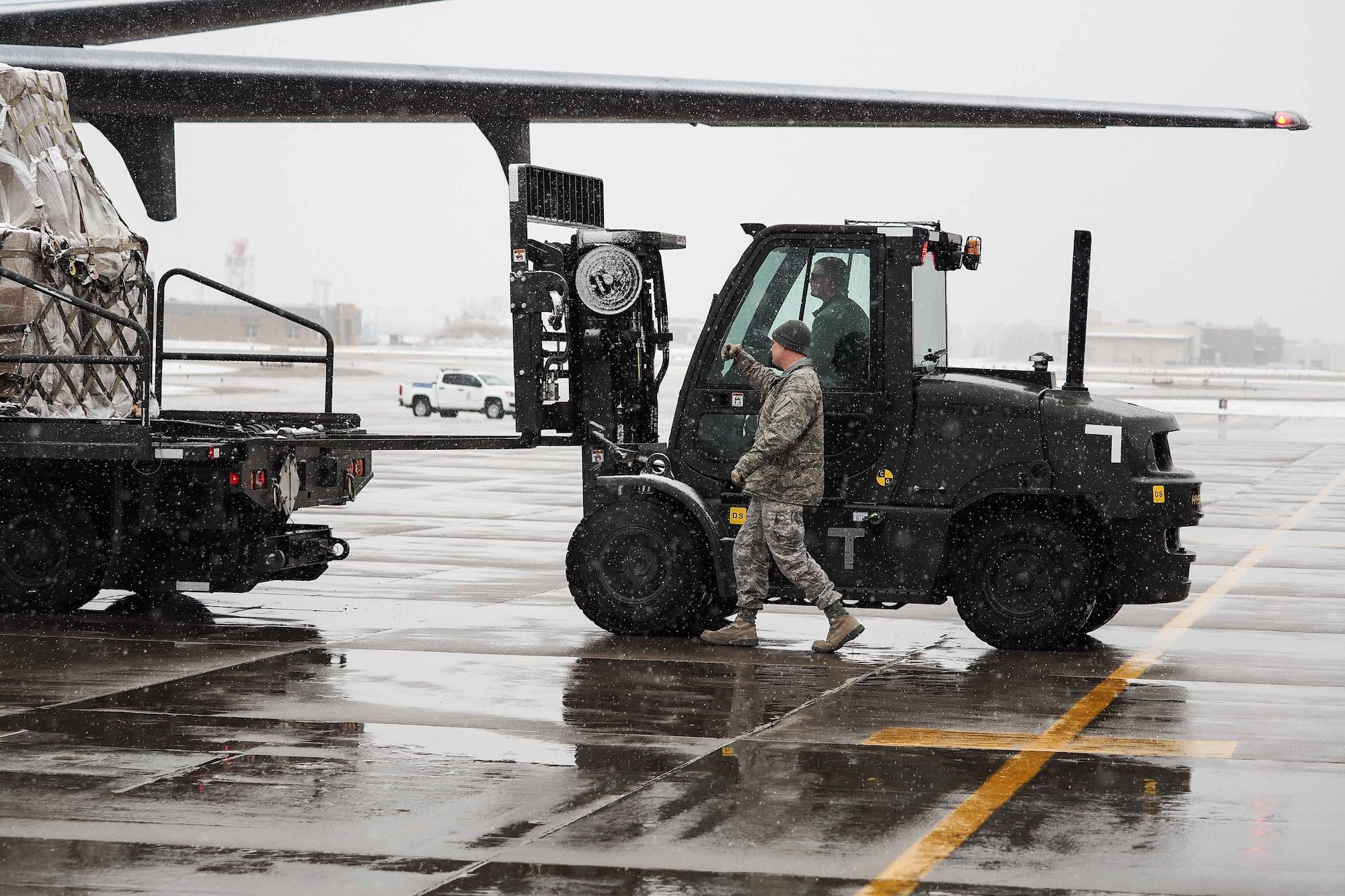 Humanitarian cargo is loaded on to a KC-10 by 27th Aerial Port Squadron members as part of the Denton program. (Air Force Photo/Paul Zadach)