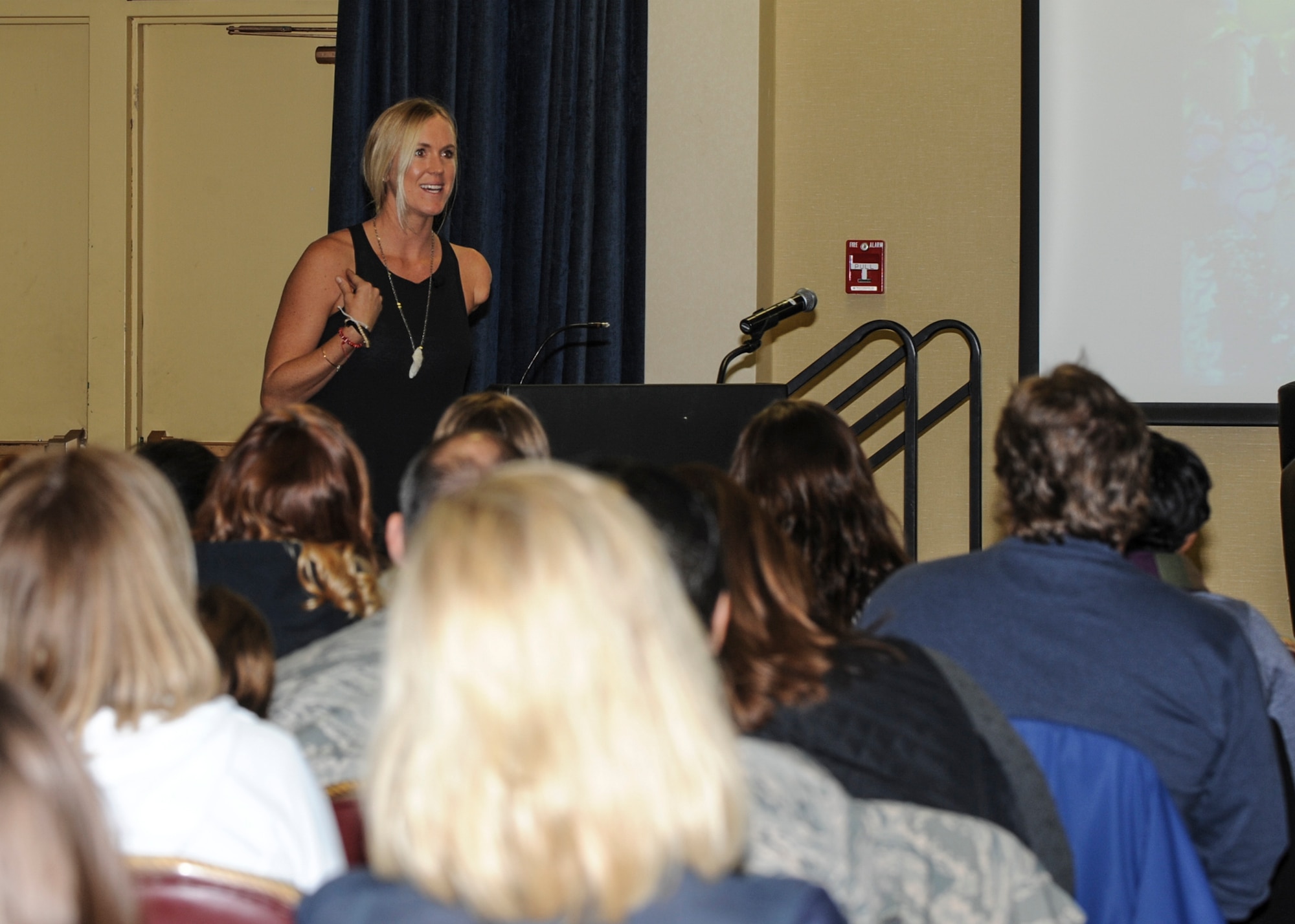 Professional surfer Bethany Hamilton speaks to Ellsworth Airmen and civilians at Ellsworth Air Force Base, S.D., March 31, 2016. Hamilton emphasized how her faith was an important part of overcoming new challenges she faced after losing her arm in a shark attack. (U.S. Air Force photo by Airman 1st Class Denise M. Nevins/Released)