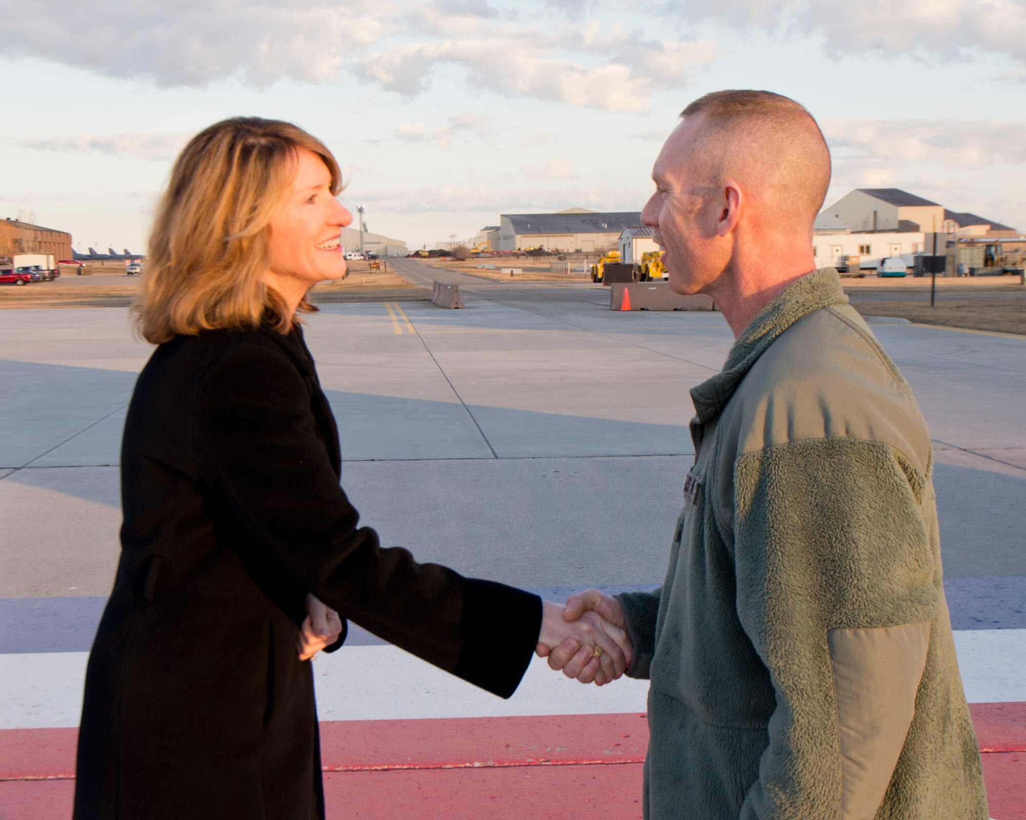 The honorable Lisa Disbrow, undersecretary of the Air Force, shakes hands with Chief Master Sgt. Geoff Weimer at Minot Air Force Base, N.D., March 30, 2016. Disbrow and Lt. Gen. Jack Weinstein’s, deputy chief of staff for strategic deterrence and nuclear integration, visit included the 54th Helicopter Squadron, a Missile Alert Facility Golf, Tactical Response Force and concluded at Dock 8. (U.S. Air Force photo/Airman 1st Class J.T. Armstrong)