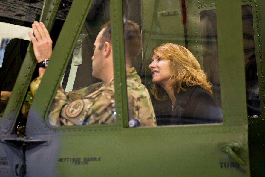 The honorable Lisa Disbrow, undersecretary of the Air Force, is shown a UH-1N Iroquois by Lt. Col. Gage Bryson, 54th Helicopter Squadron commander, at Minot Air Force Base, N.D., March 28, 2016. Disbrow and Lt. Gen. Jack Weinstein’s, deputy chief of staff for strategic deterrence and nuclear integration, visit included the 54th Helicopter Squadron, a Missile Alert Facility, Tactical Response Force and concluded at Dock 8. (U.S. Air Force photo/Airman 1st Class J.T. Armstrong) 
