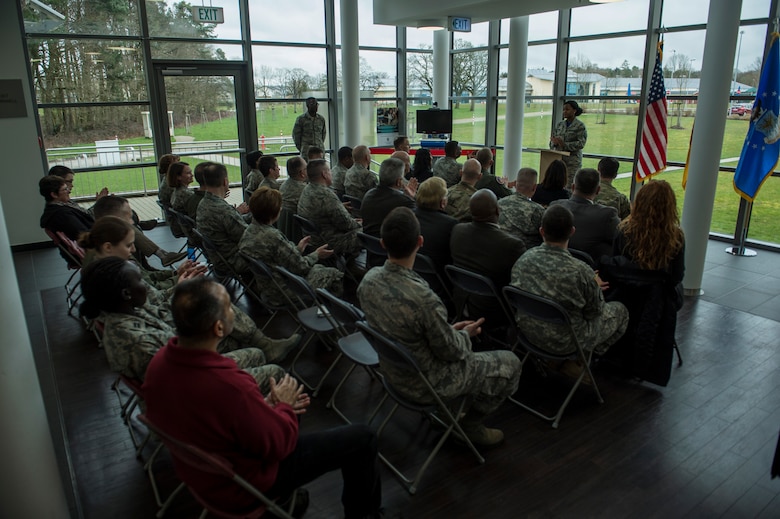 Members of the 52nd Fighter Wing attend the 52nd Medical Group/Landstuhl Regional Medical Center Telehealth ribbon cutting ceremony inside the 52nd MDG clinic April 1, 2016, at Spangdahlem Air Base, Germany. The Telehealth program will provide real-time video teleconference capabilities to patients from Spangdahlem Air Base and LRMC. (U.S. Air Force photo by Senior Airman Rusty Frank/Released)